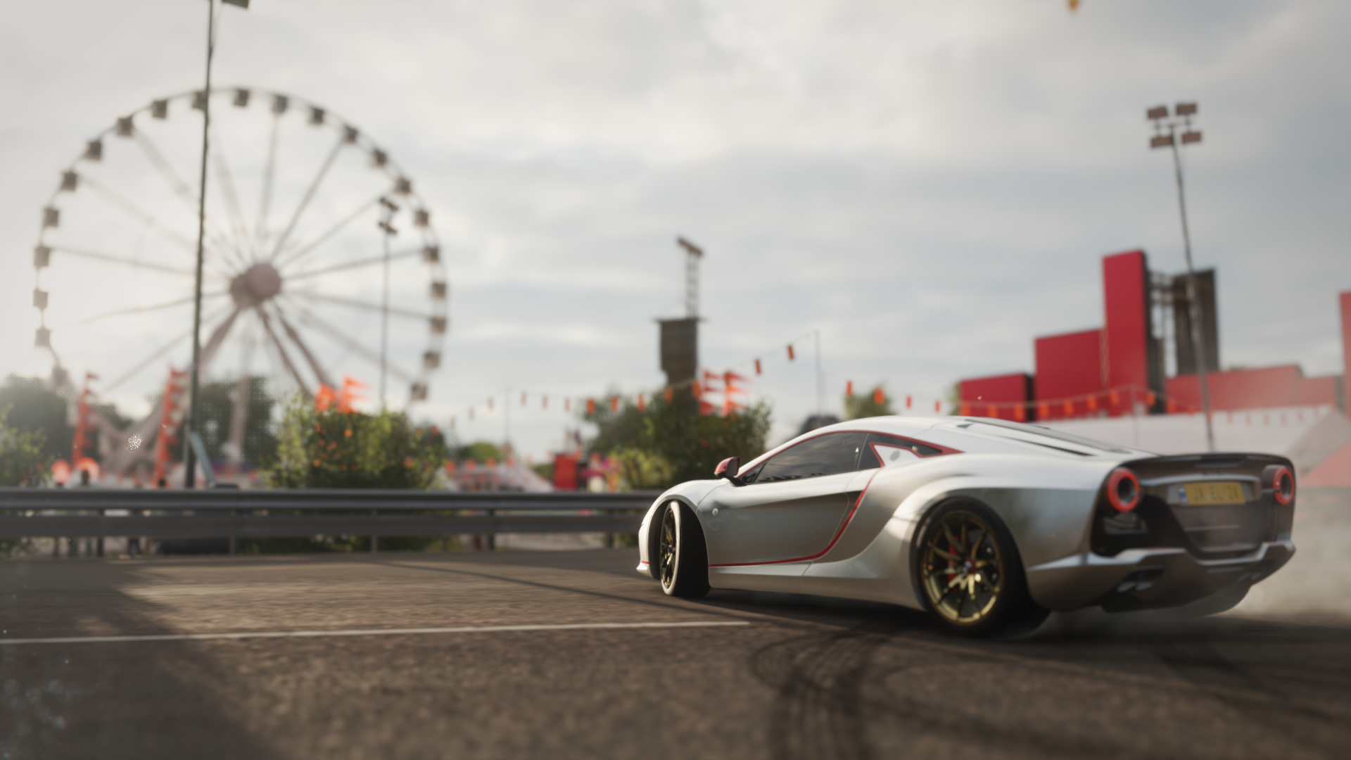 White sports car drifting at a fairground with a Ferris wheel HD Wallpaper