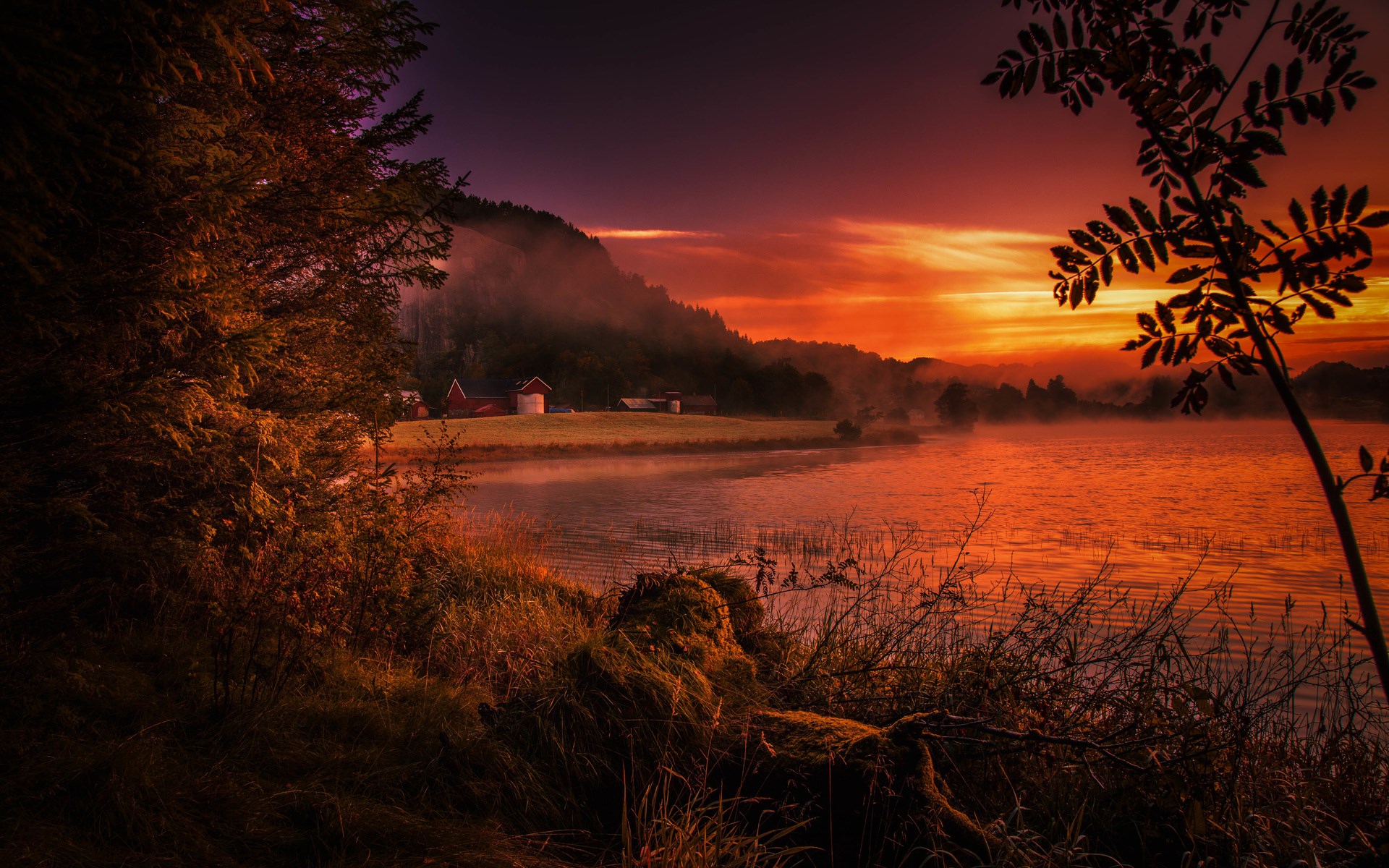 Sunset over a lake with a farm and trees HD Wallpaper