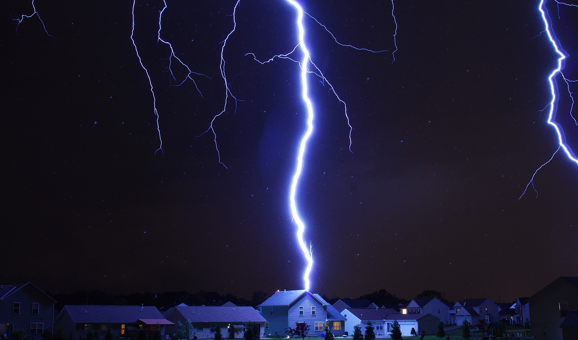 Lightning striking a house at night HD Wallpaper