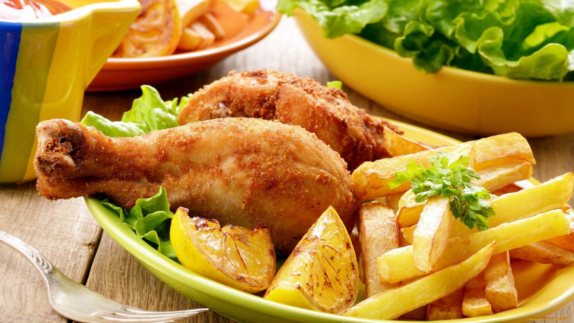 Fried chicken with french fries and lemon wedges HD Wallpaper