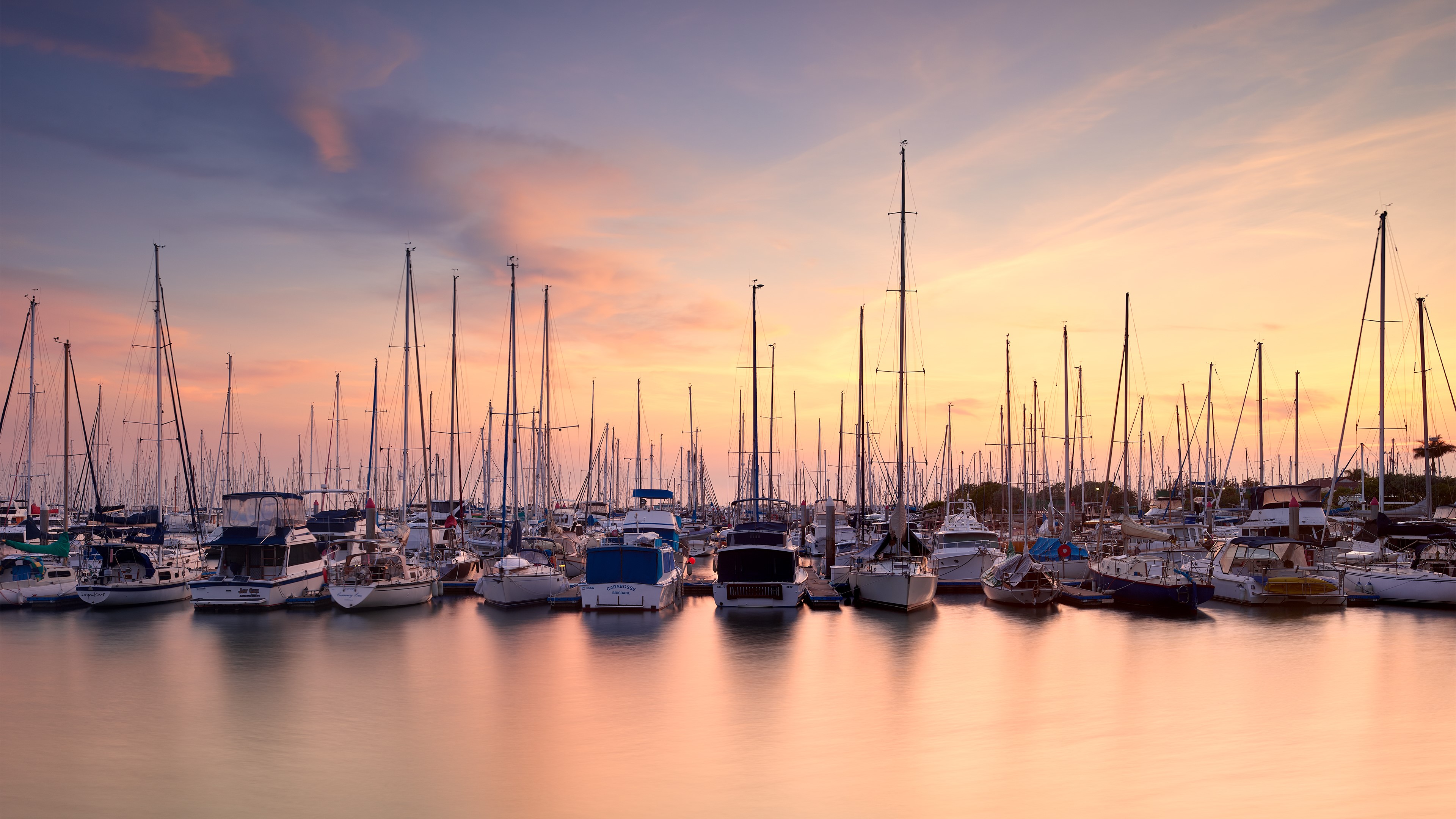 Yachts in a harbor at sunrise or sunset HD Wallpaper