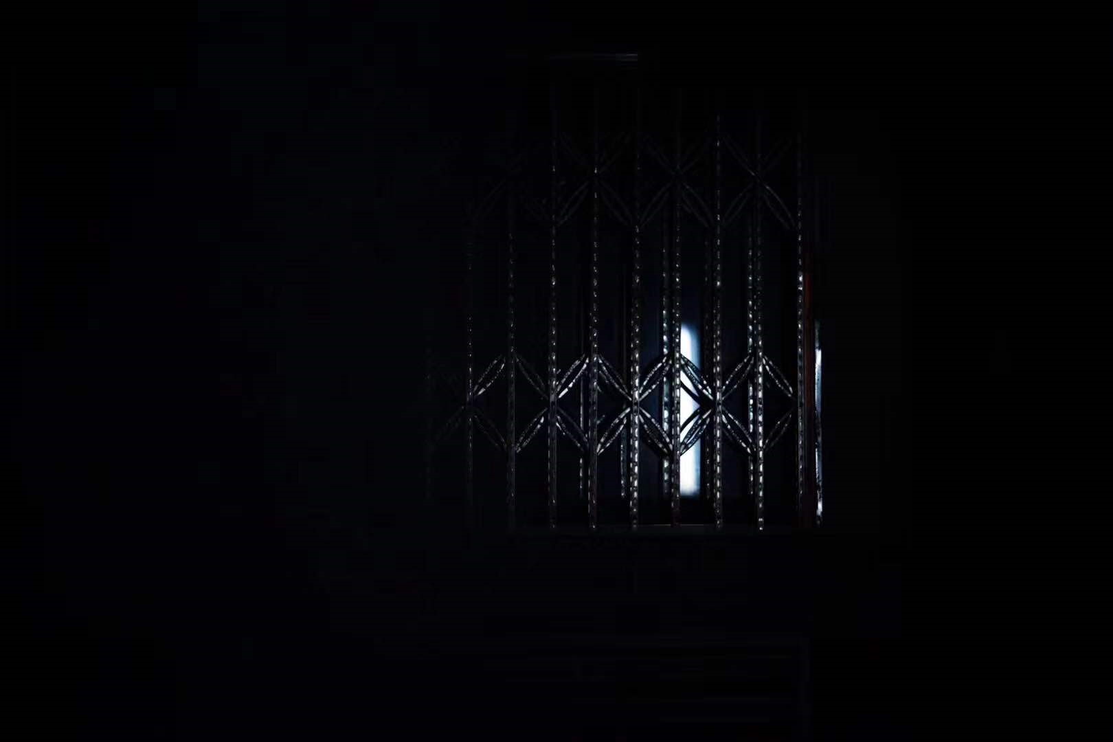 Darkness with a metal gate and light HD Wallpaper