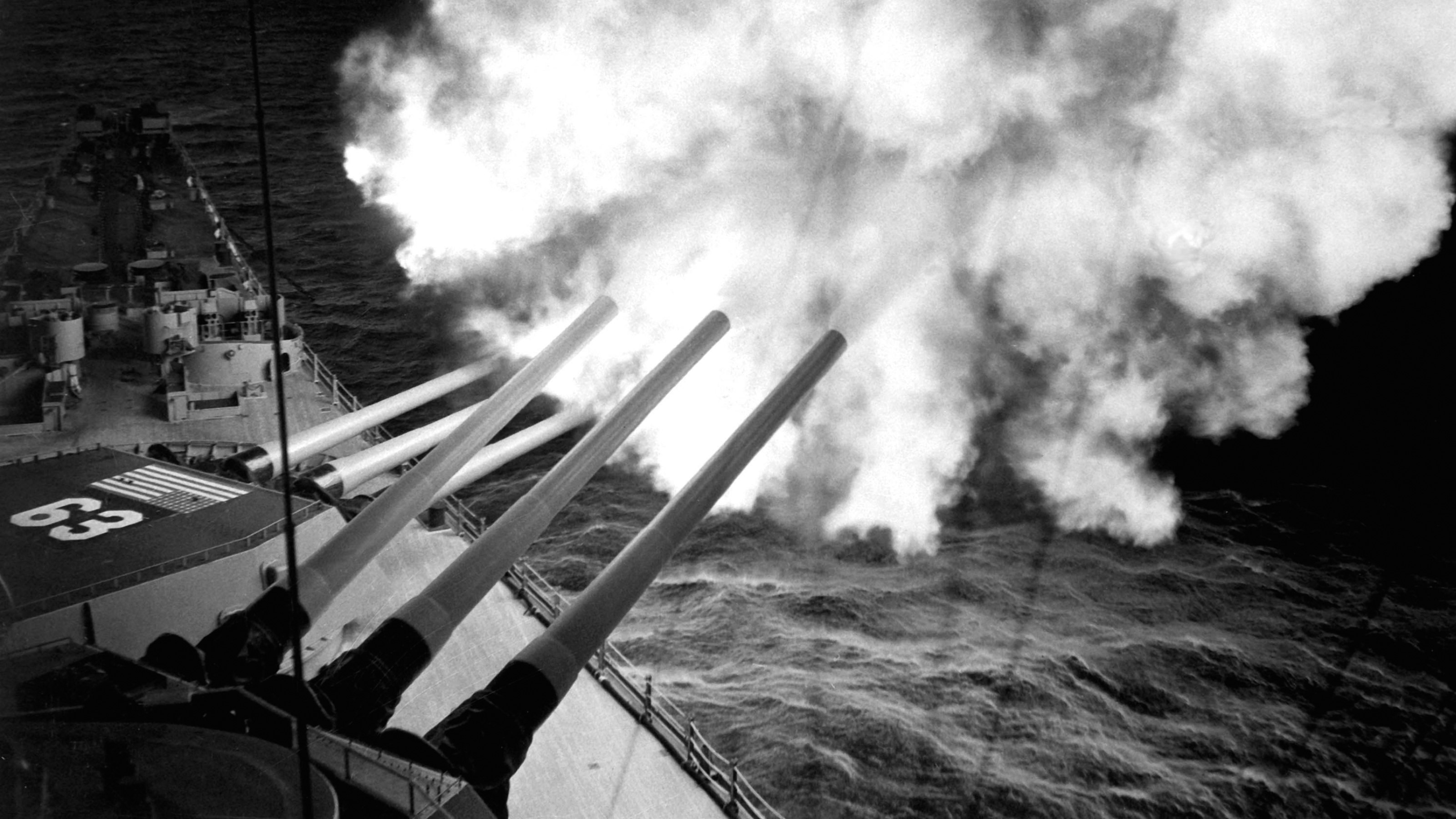 Battleship firing its main guns HD Wallpaper