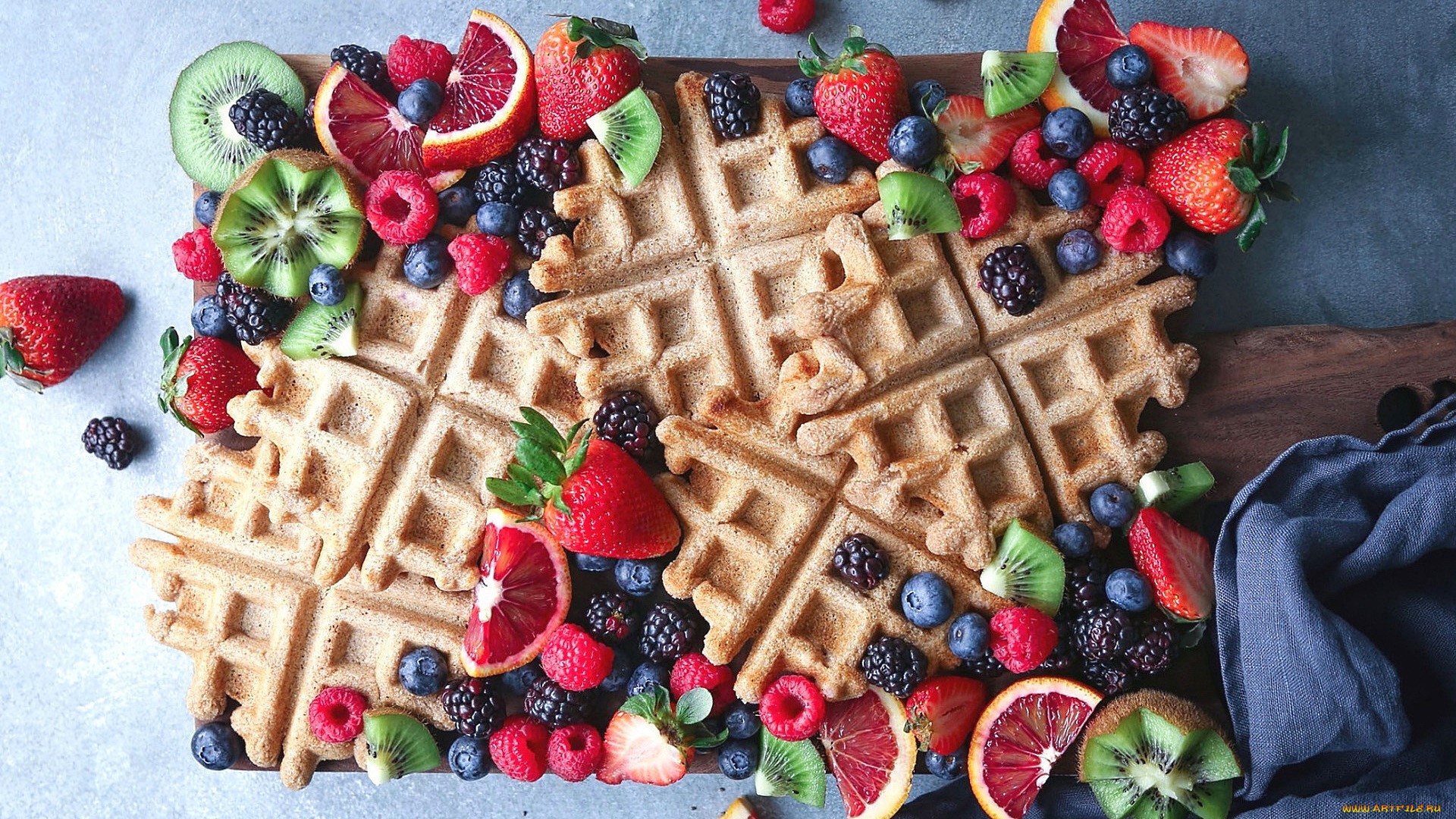 Waffles with fresh berries and fruits on a wooden board HD Wallpaper