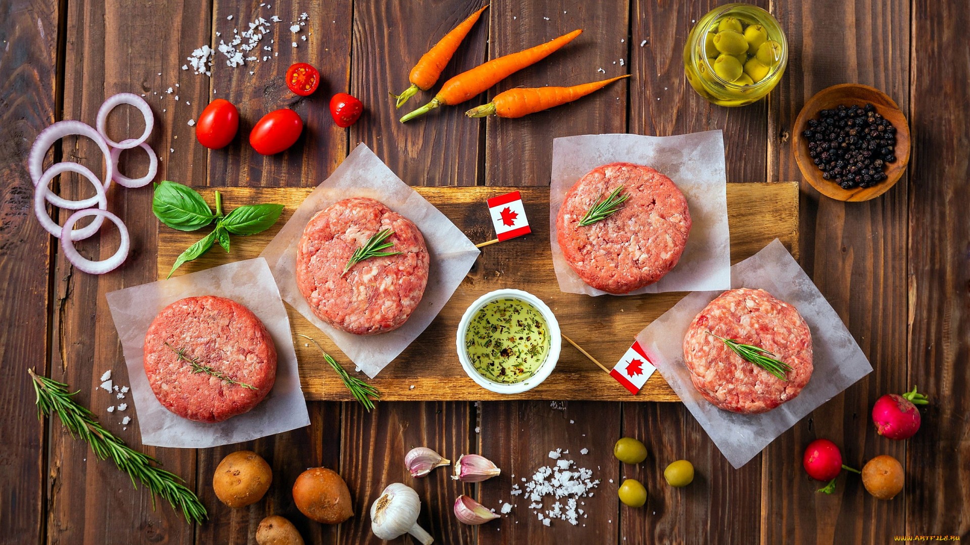 Raw burger patties with vegetables and spices on wooden table HD Wallpaper