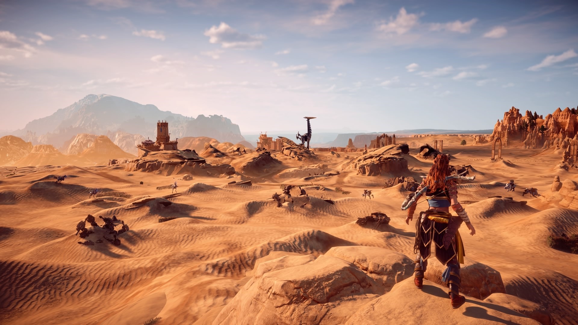 Aloy from Horizon Zero Dawn in a desert landscape HD Wallpaper