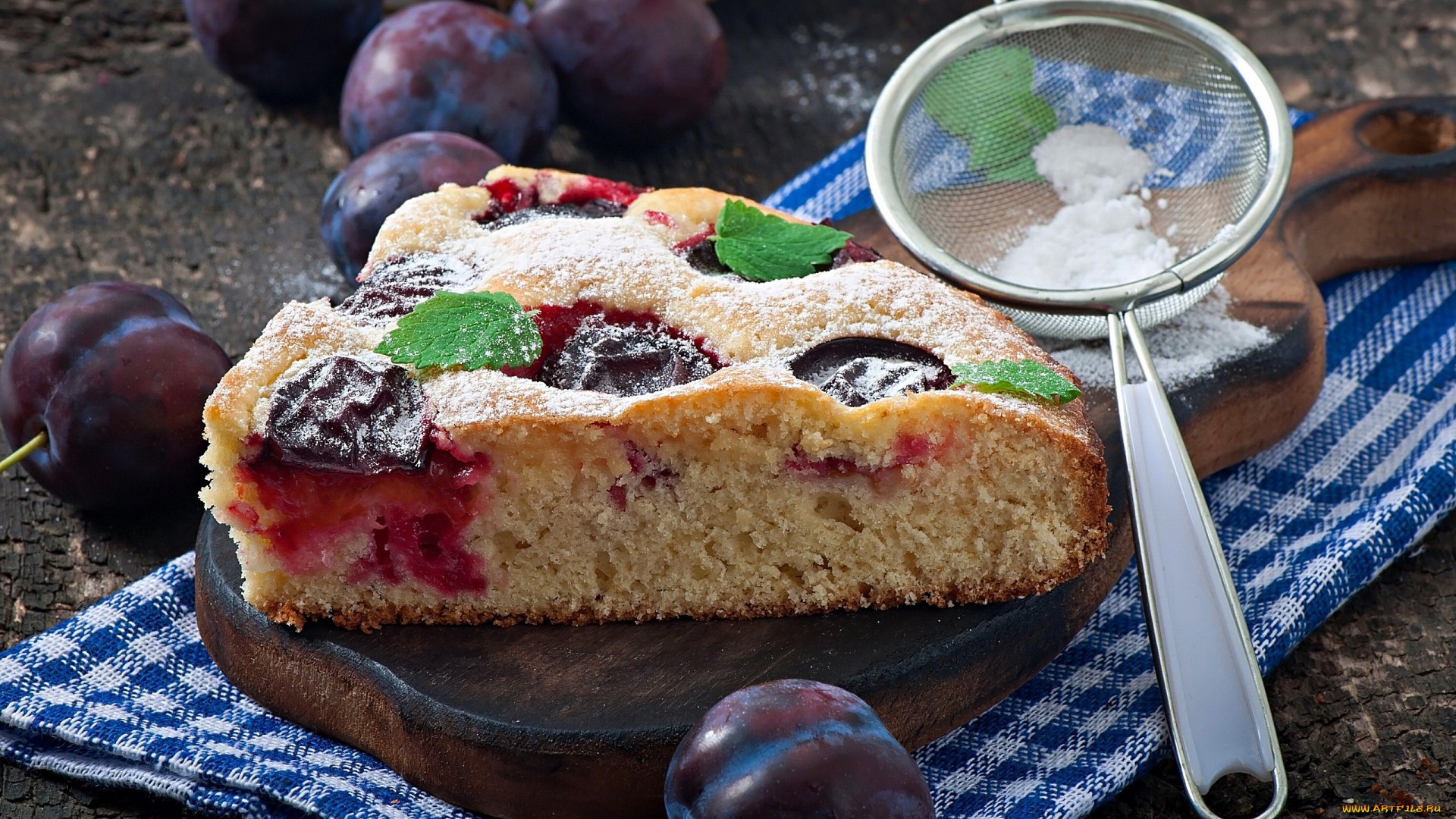 Plum cake with powdered sugar and mint leaves HD Wallpaper