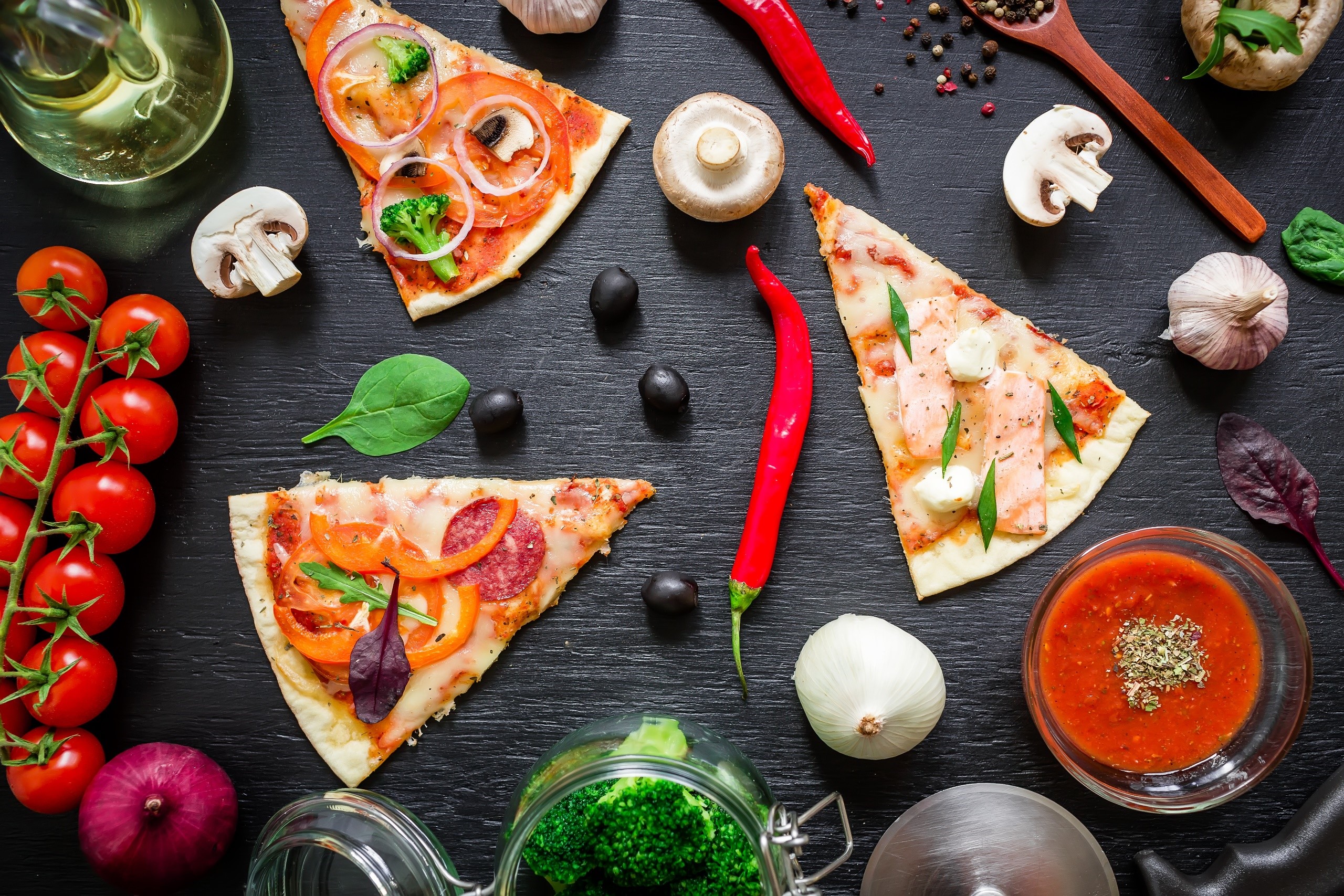 Pizza slices with ingredients and sauce HD Wallpaper
