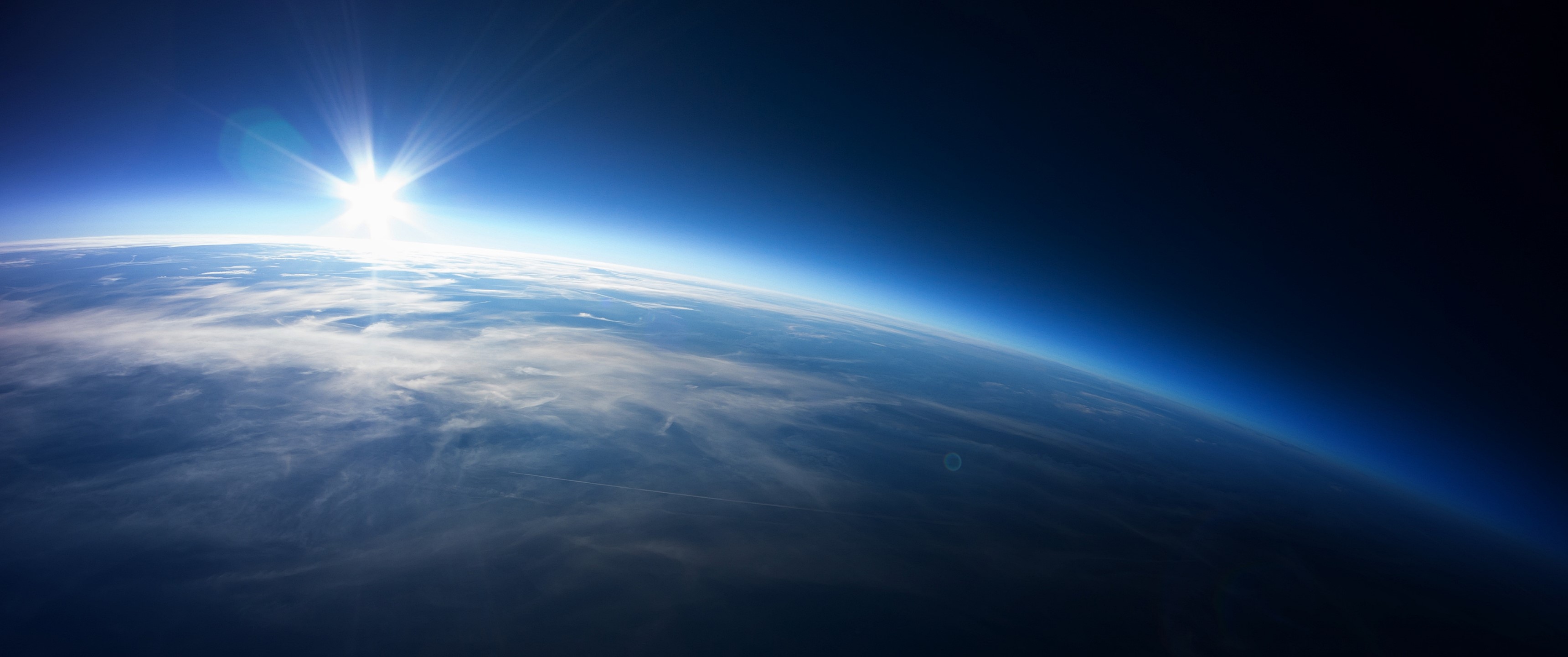 Earth from space with sunrise HD Wallpaper