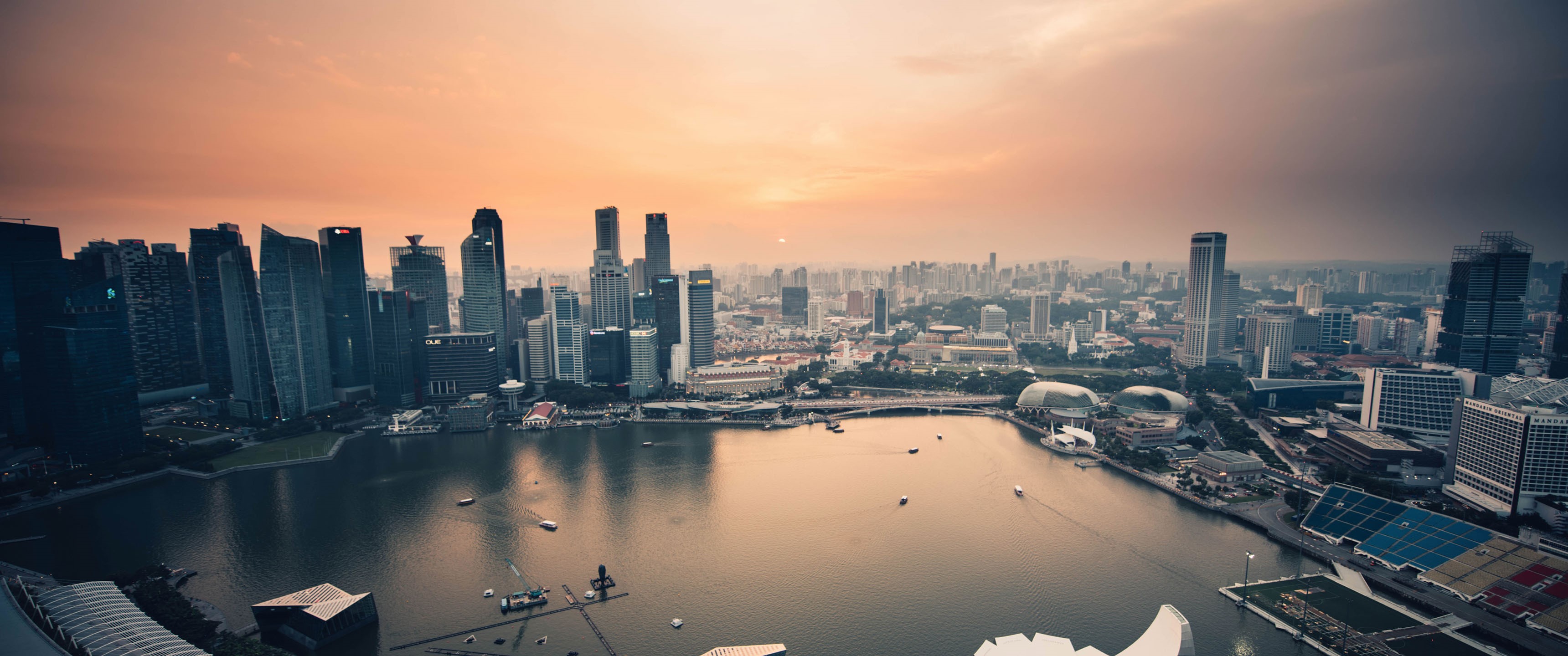Singapore cityscape with bay at sunset HD Wallpaper