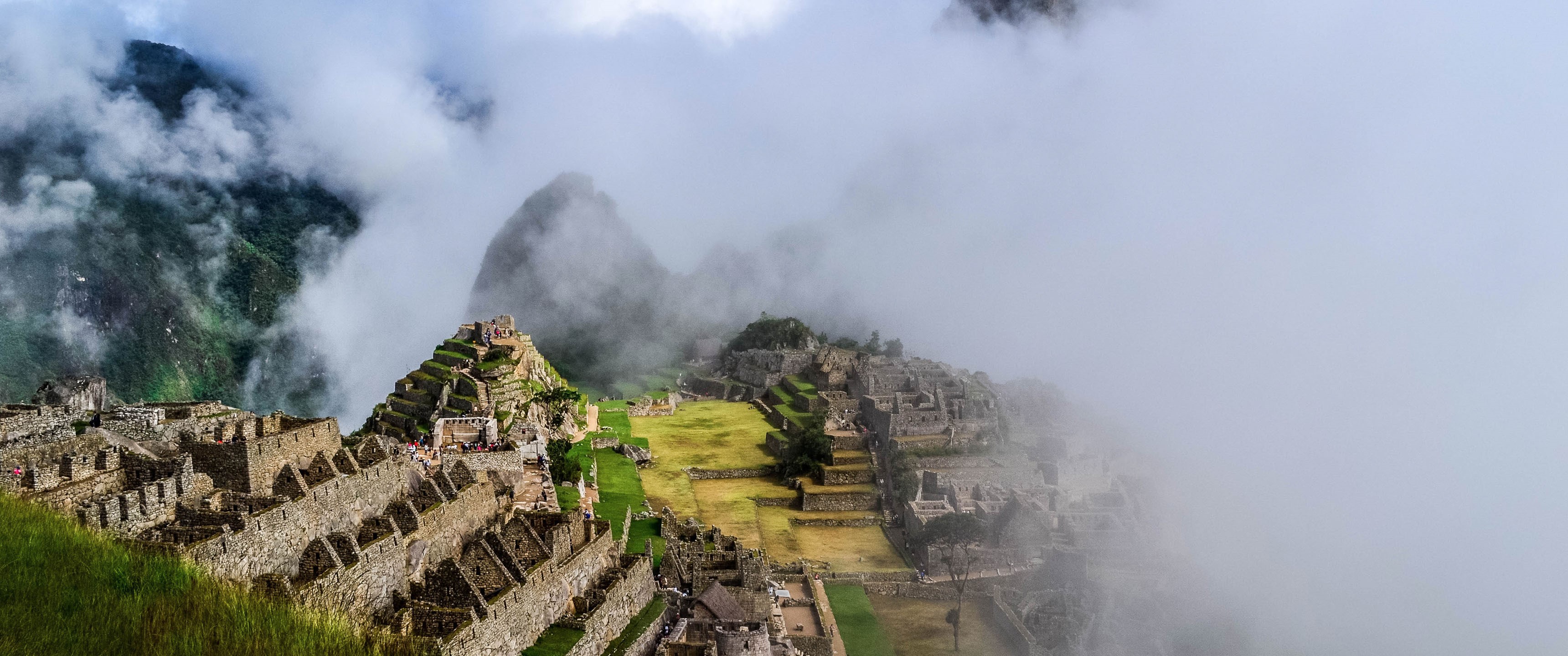 Machu Picchu ruins in Peru shrouded in mist HD Wallpaper