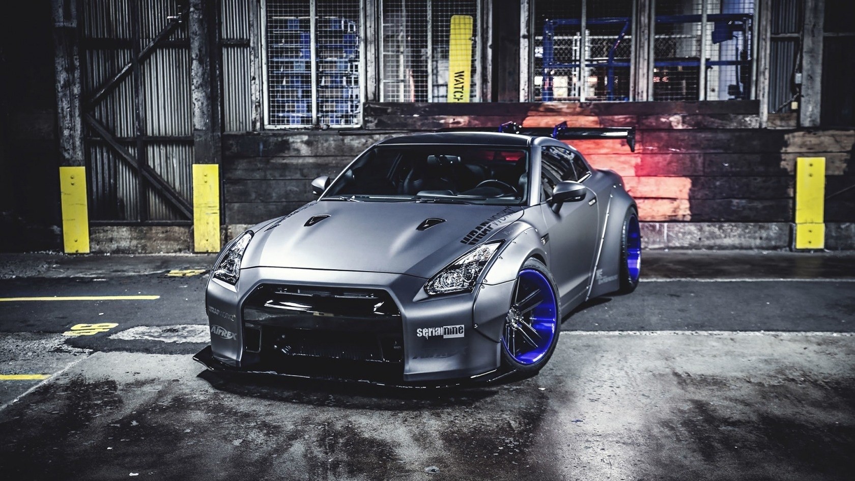 Matte gray Nissan GT-R with blue wheels HD Wallpaper