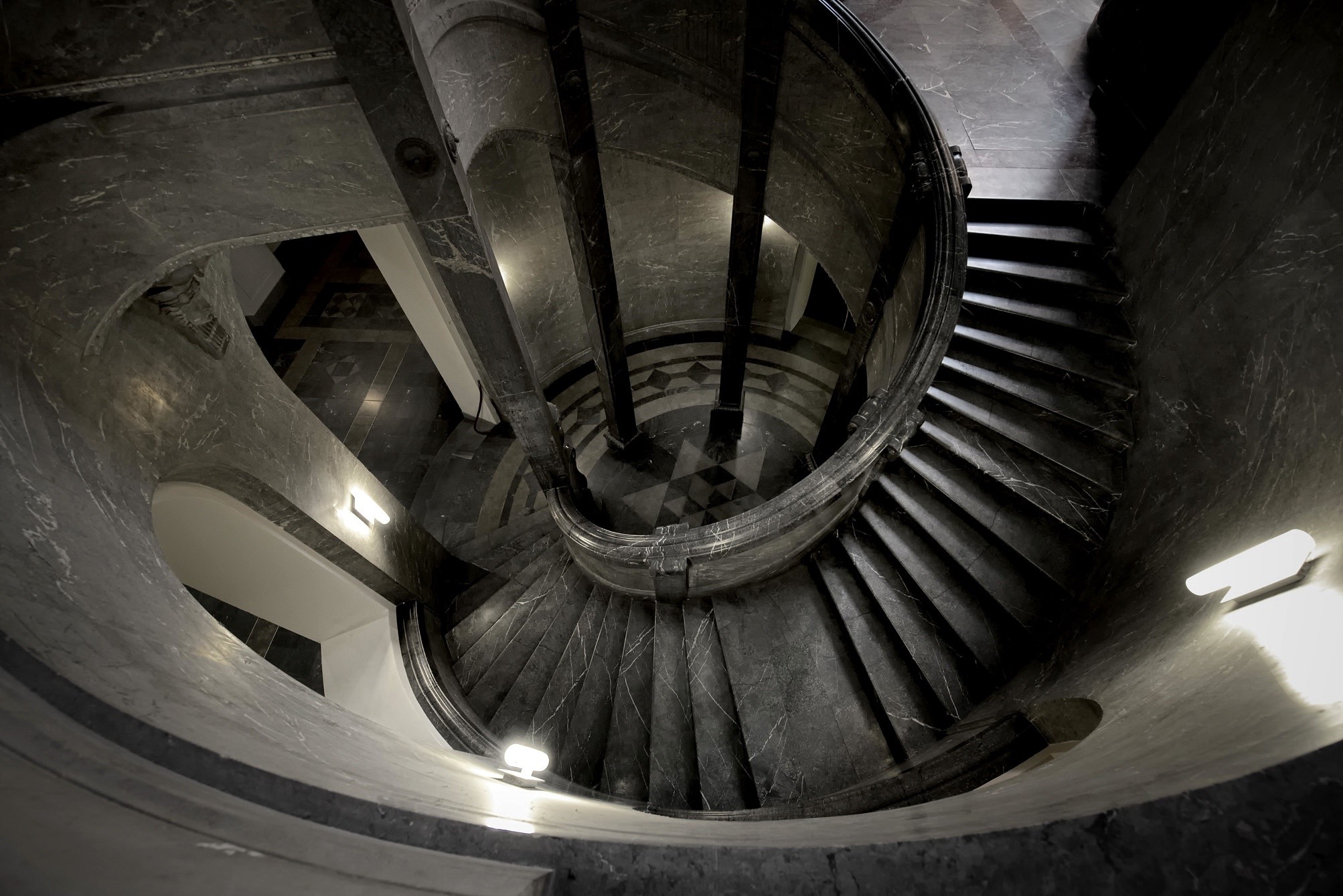 Spiral staircase in a marble building HD Wallpaper