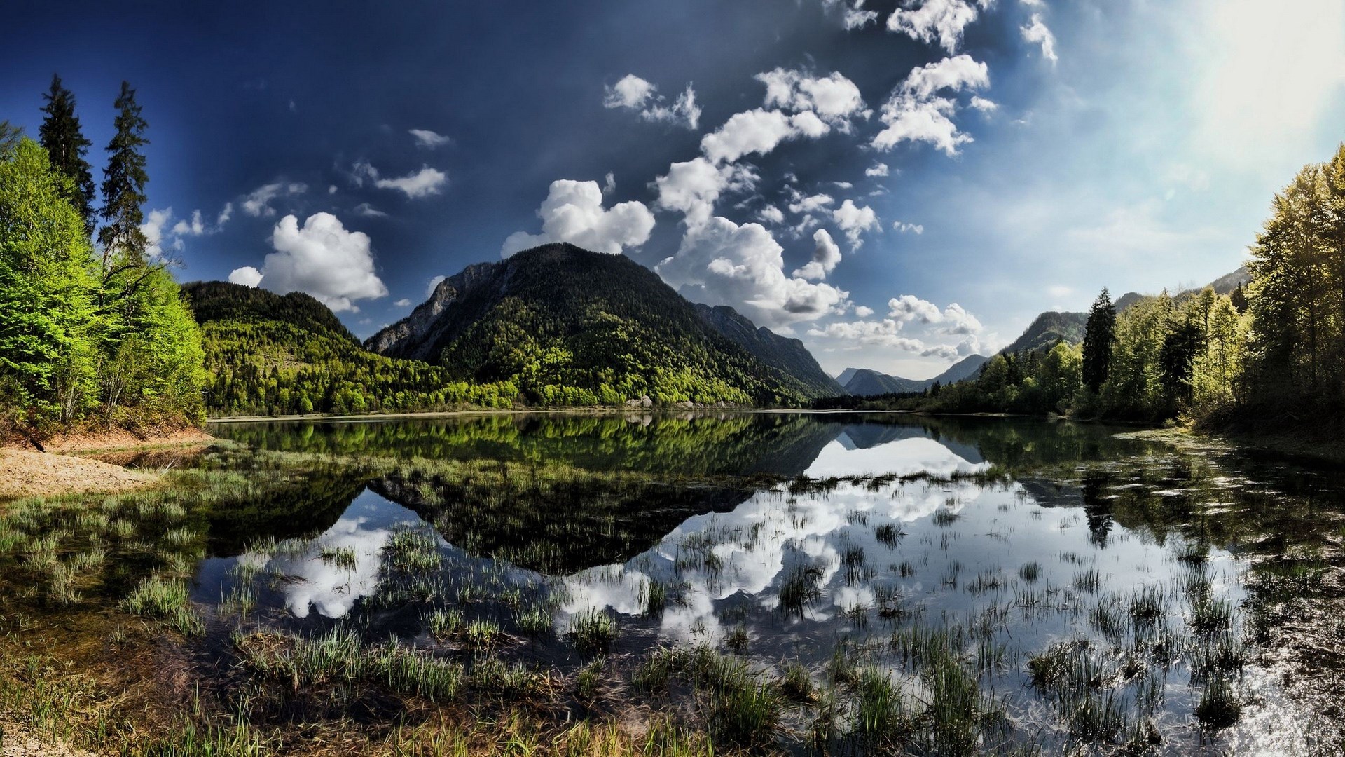 Mountain lake with reflections and clouds HD Wallpaper