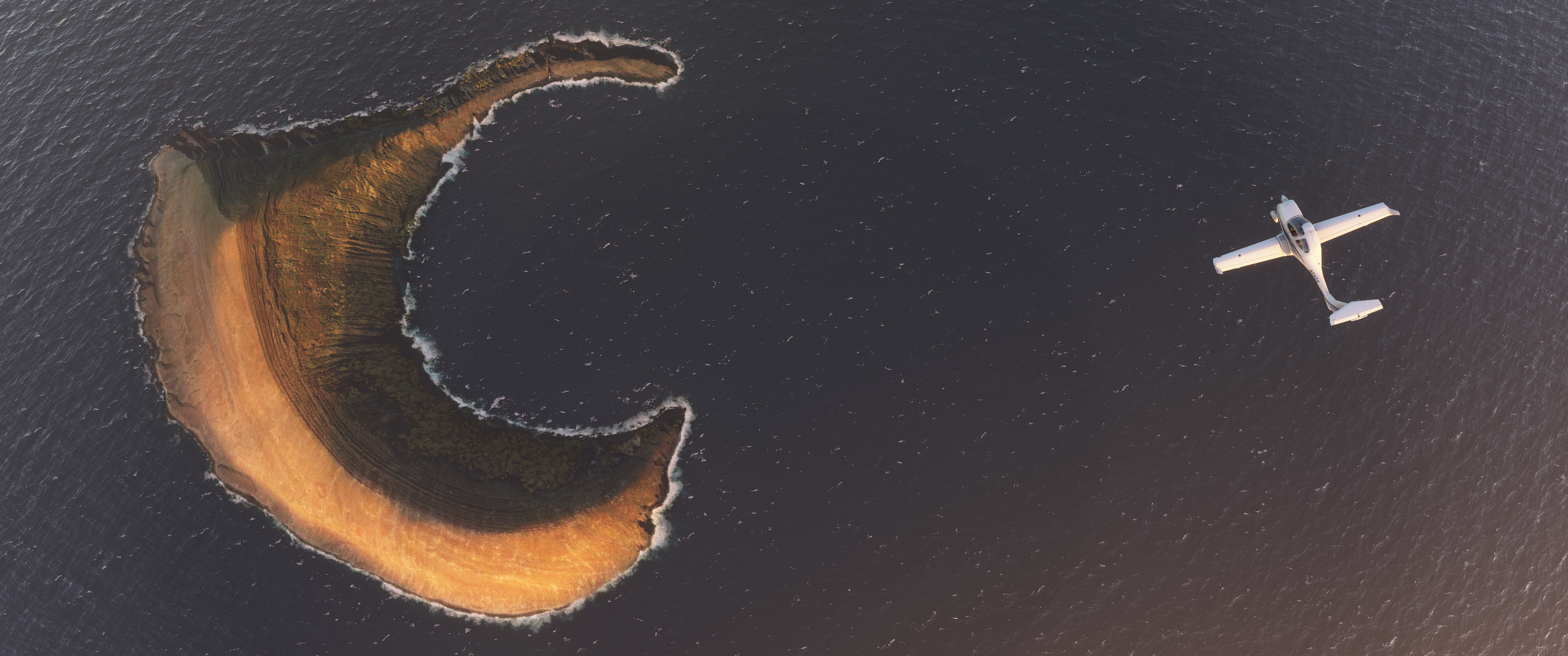 Airplane flying over a crescent-shaped island HD Wallpaper