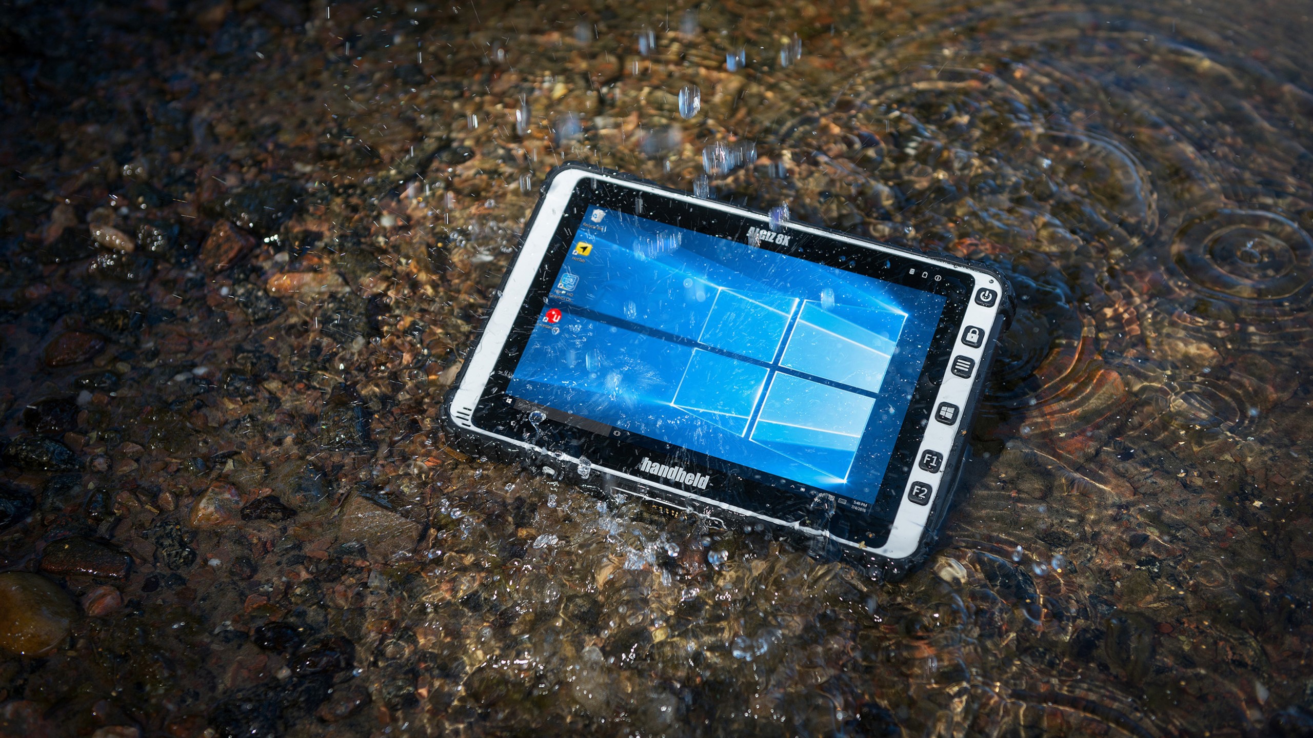 Rugged tablet with Windows 10 in water HD Wallpaper