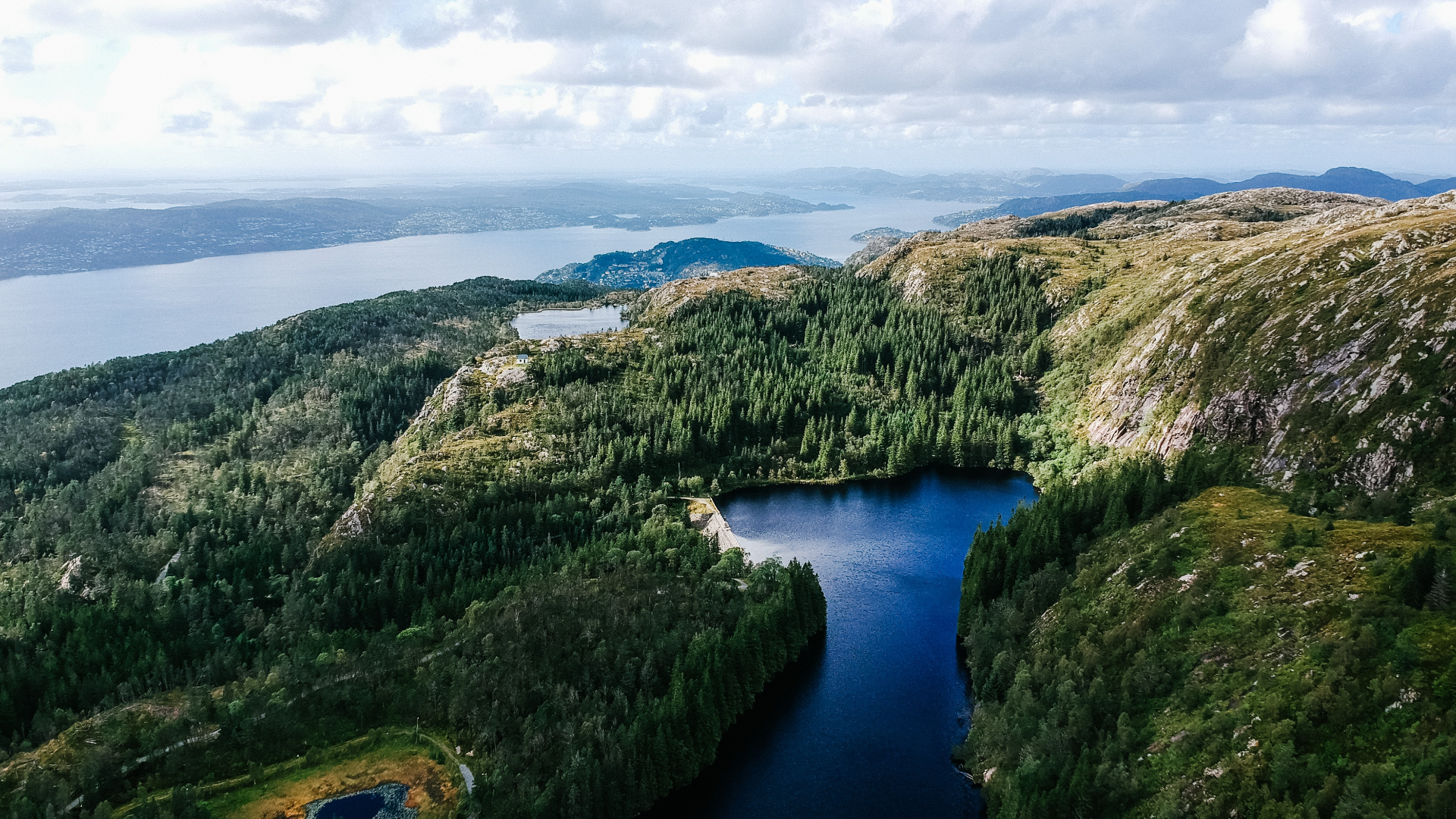 Aerial view of lakes and forests in Norway HD Wallpaper