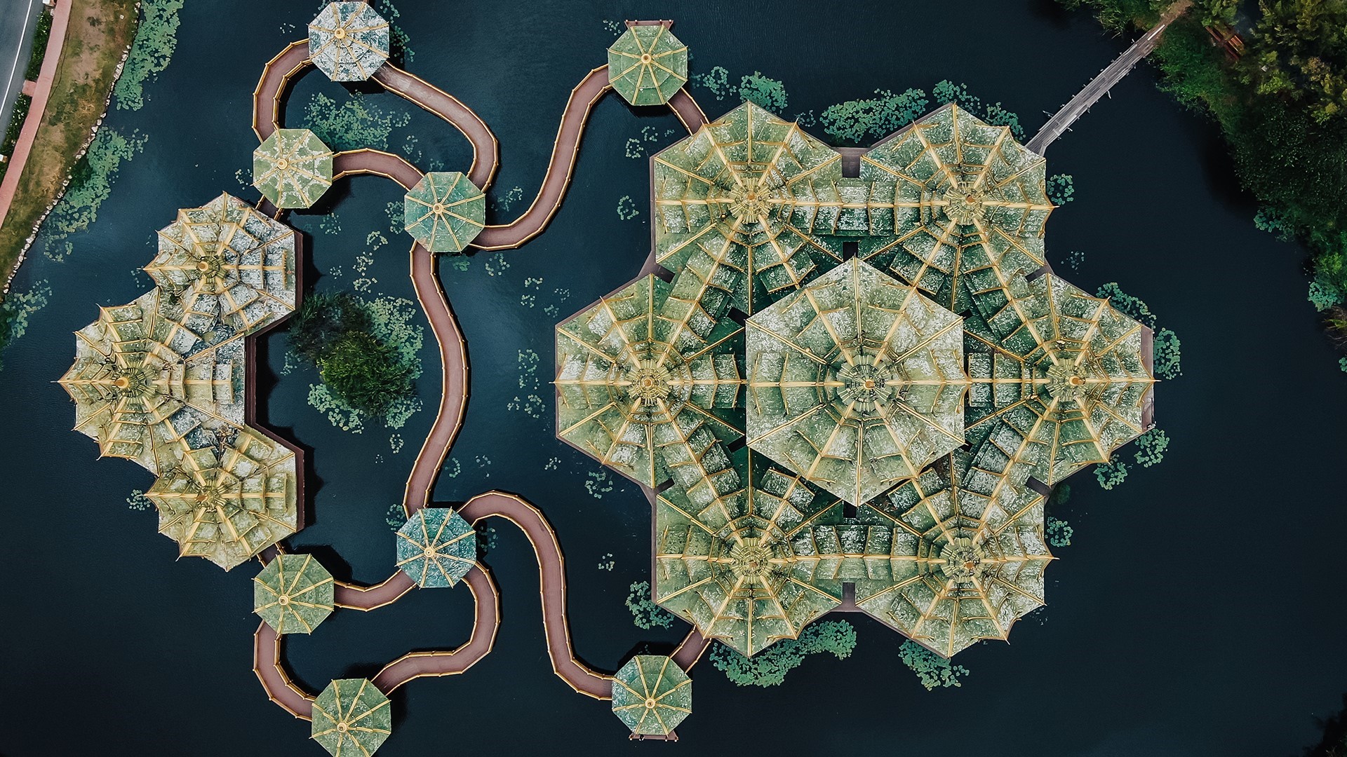 Aerial view of pavilions and walkways over a lake in Thailand HD Wallpaper