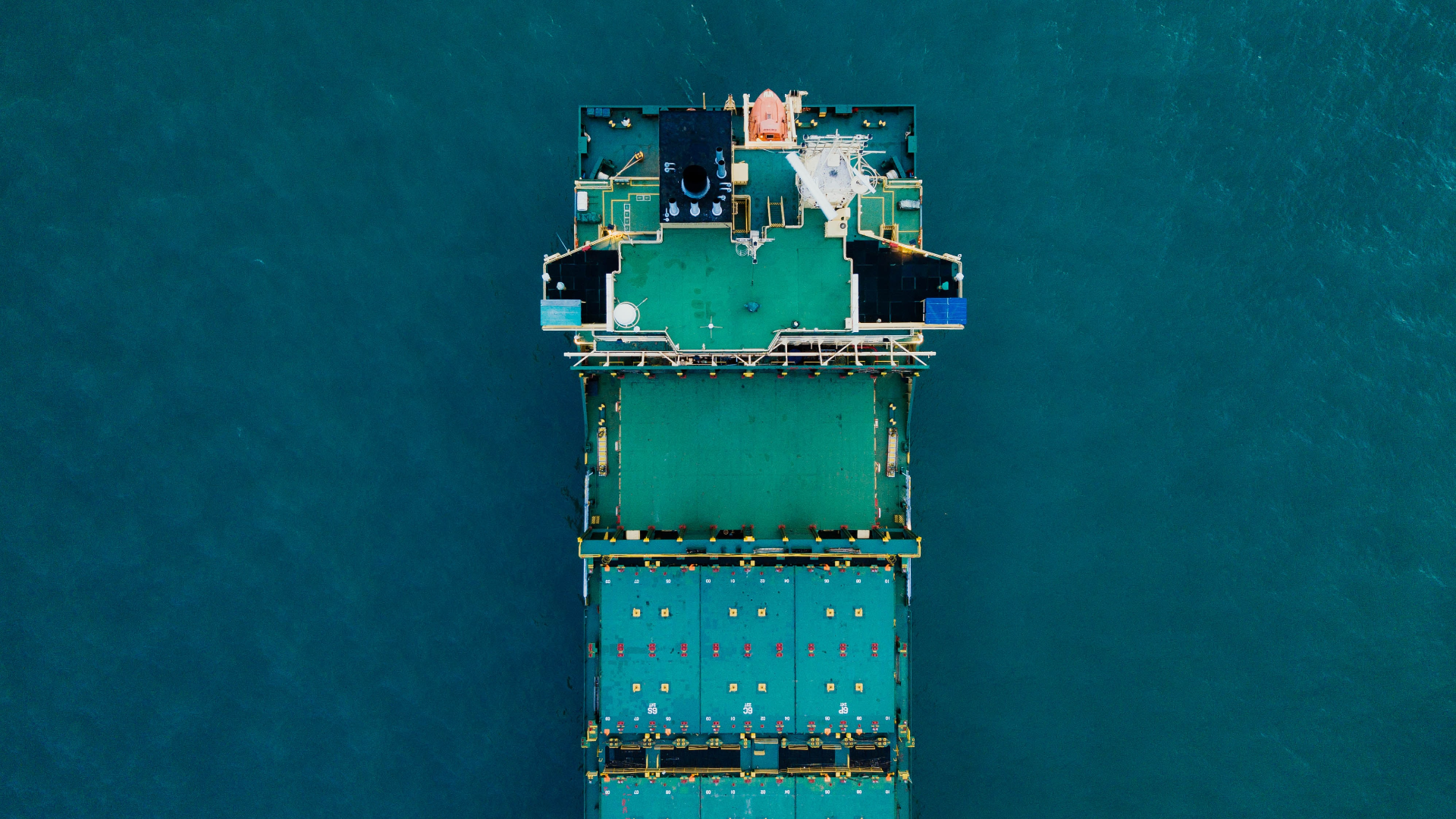 Aerial view of a large container ship at sea HD Wallpaper