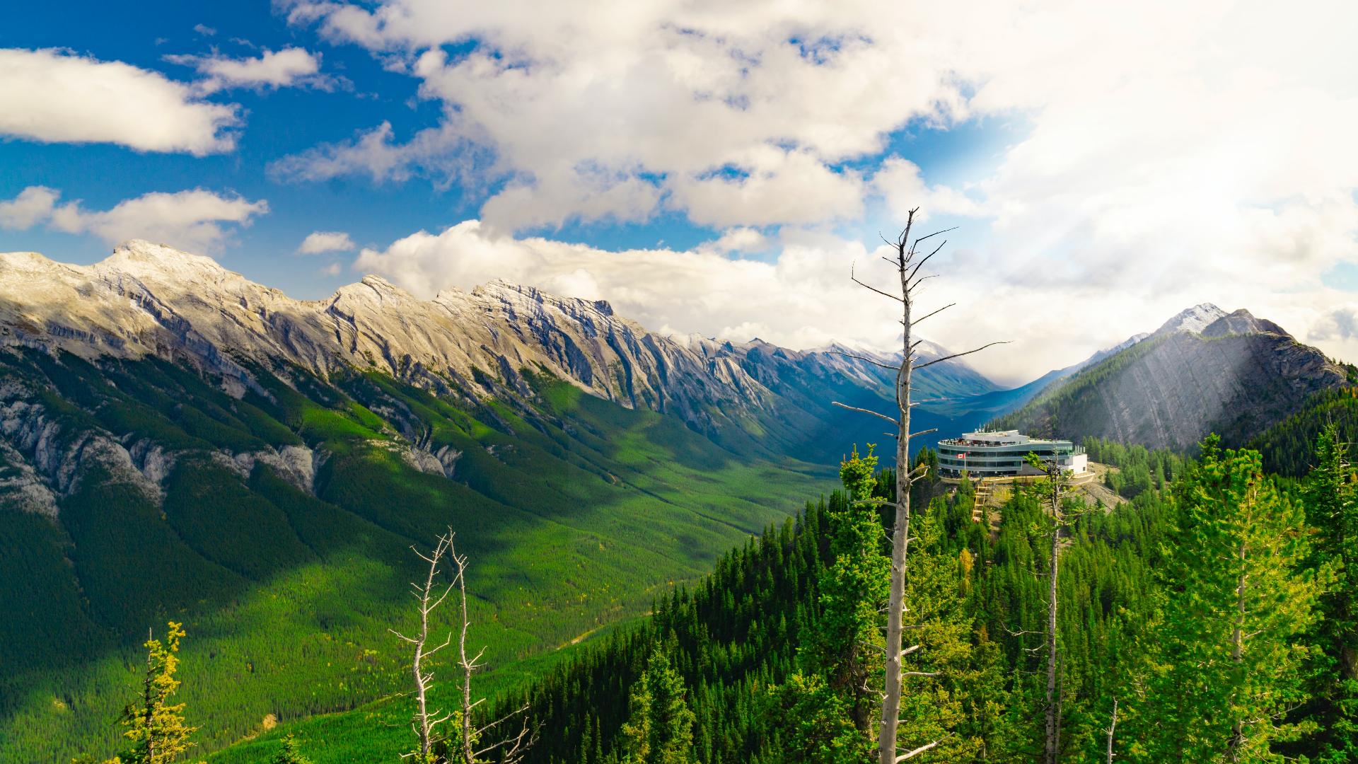 Banff National Park valley with mountains and building HD Wallpaper