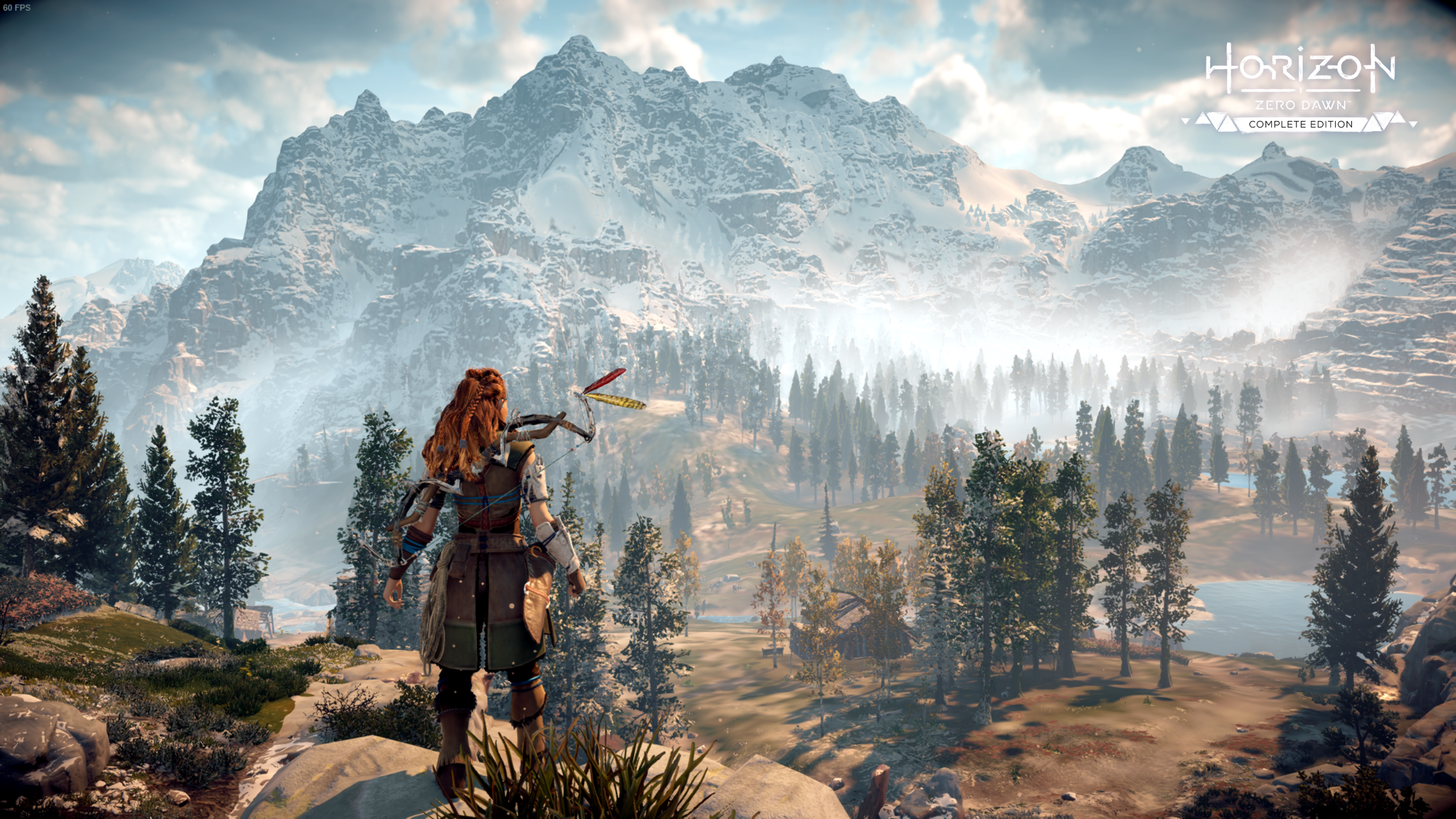 Aloy from Horizon Zero Dawn in a snowy mountain landscape HD Wallpaper