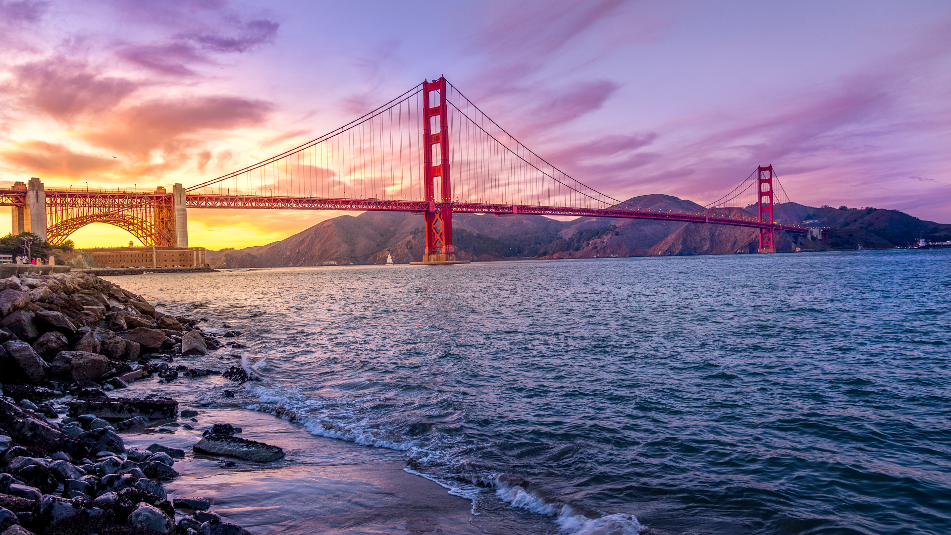 Golden Gate Bridge at Sunset with Ocean and Mountains HD Wallpaper