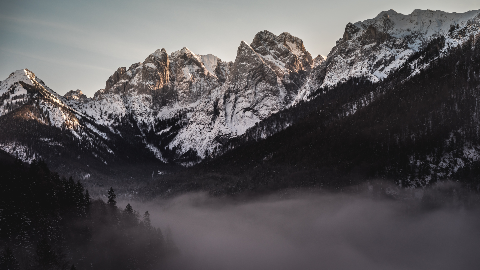Snowy mountains in Tyrol, Austria with mist HD Wallpaper
