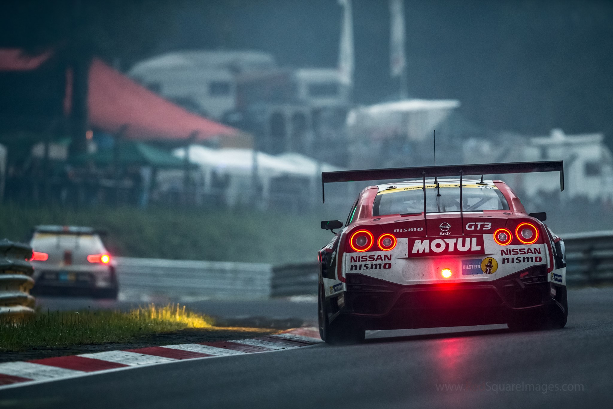 Nissan GT-R GT3 race car on a wet track HD Wallpaper