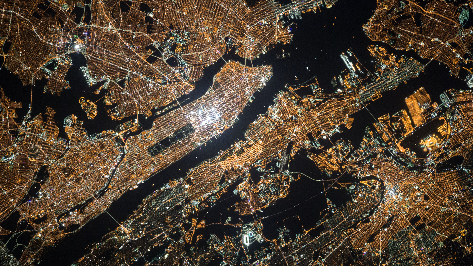 Aerial view of New York City at night HD Wallpaper