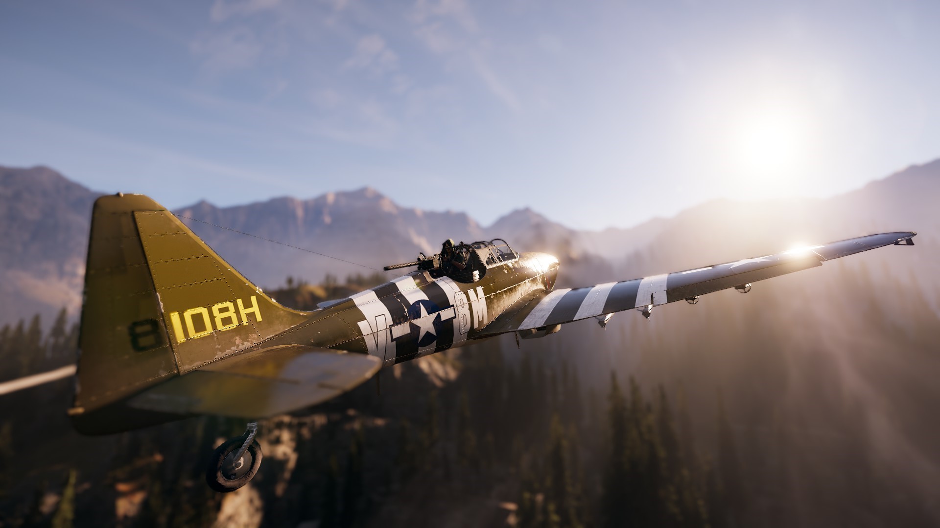 Airplane flying over mountains in Far Cry 5 HD Wallpaper