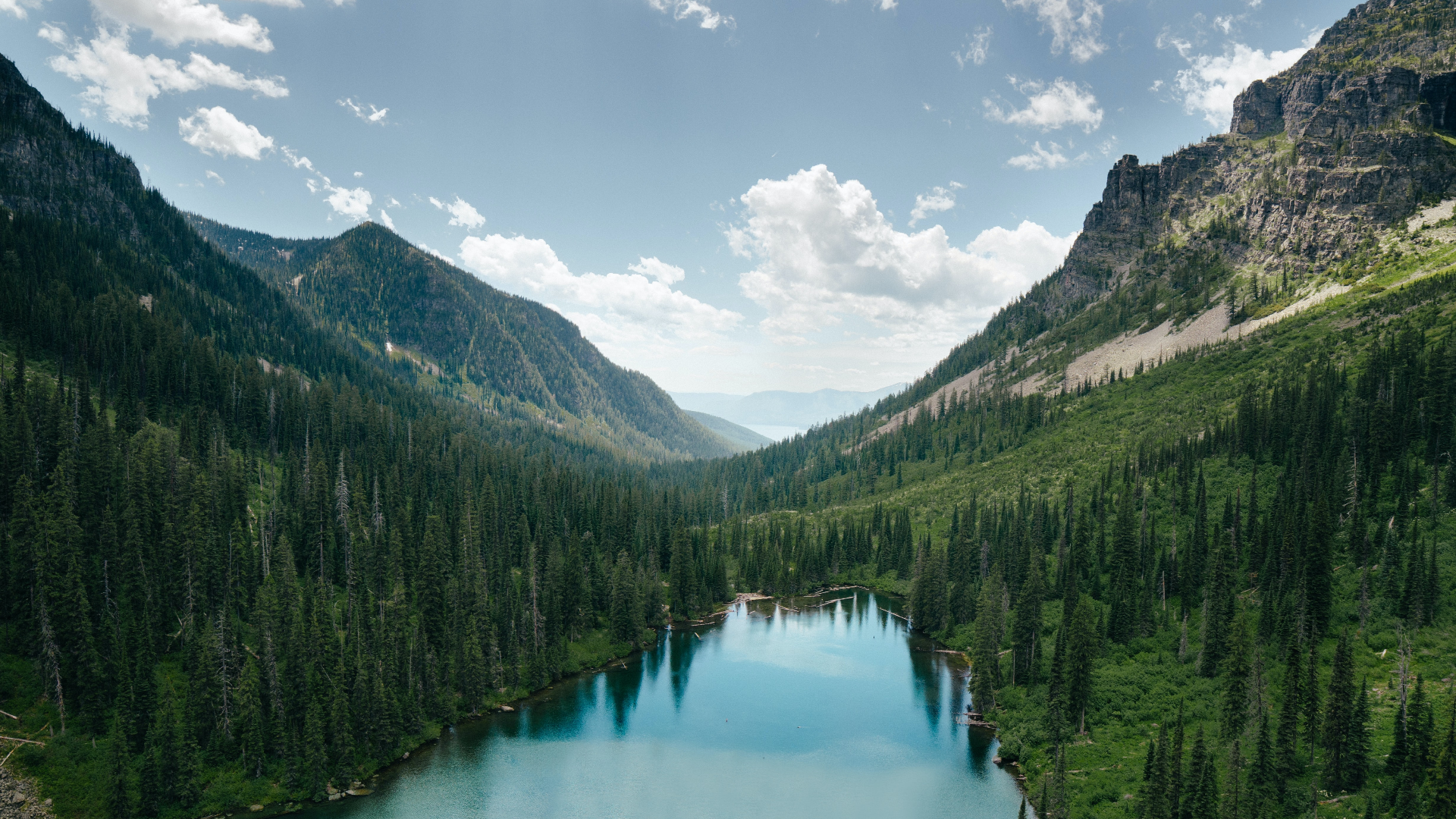 Lake in Glacier National Park with Mountains and Forest HD Wallpaper