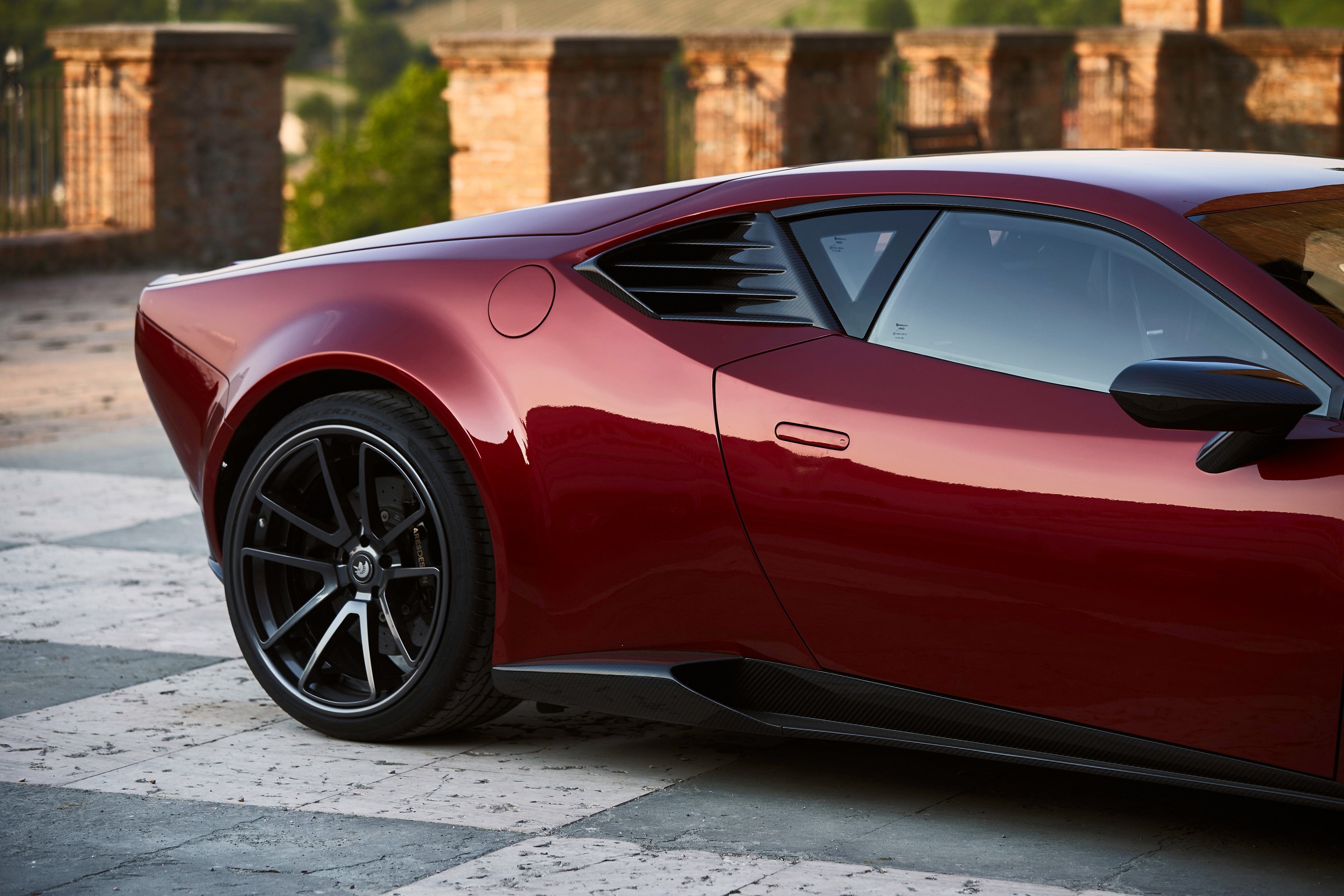 Red sports car HD Wallpaper