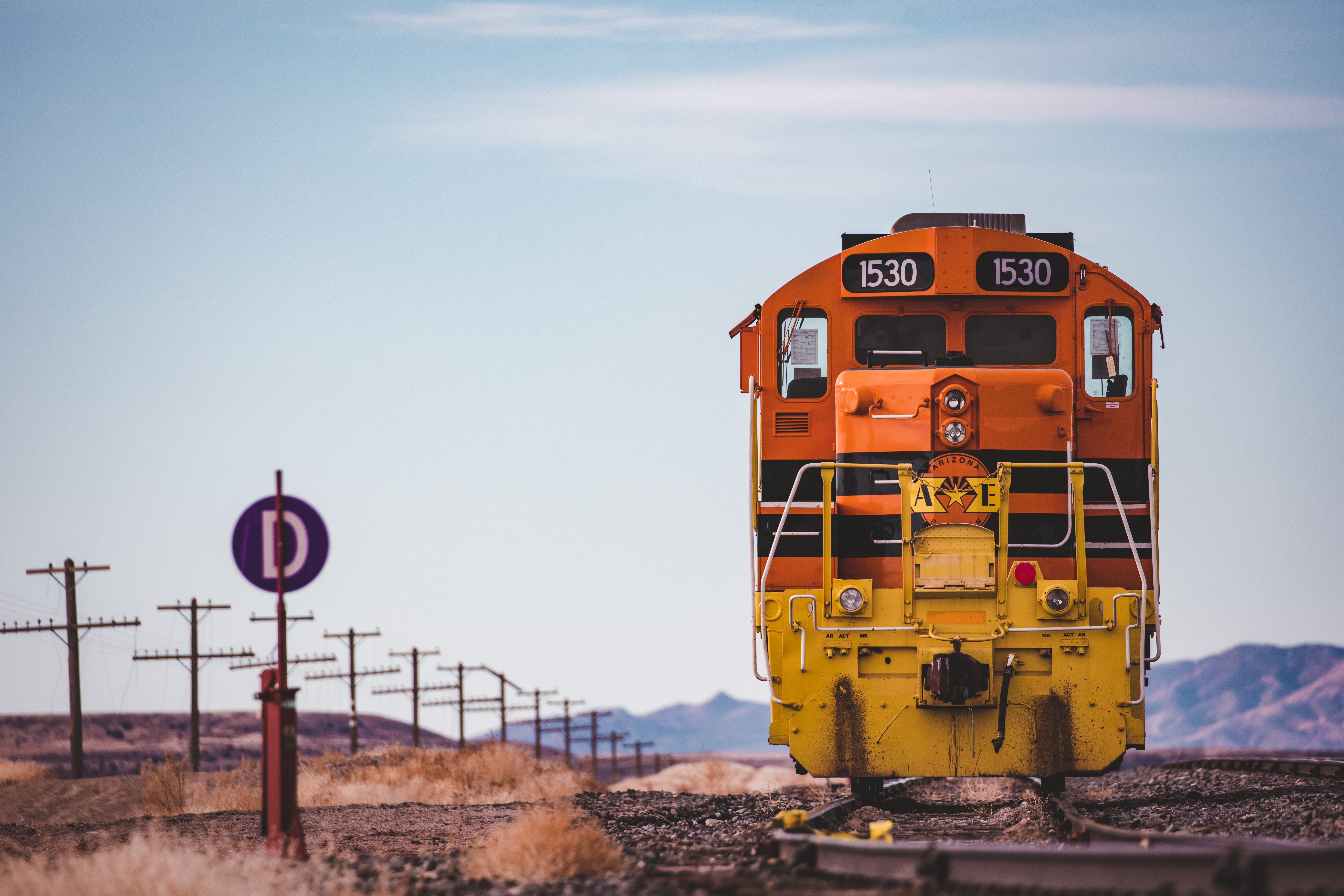4K train locomotive on railway tracks HD Wallpaper