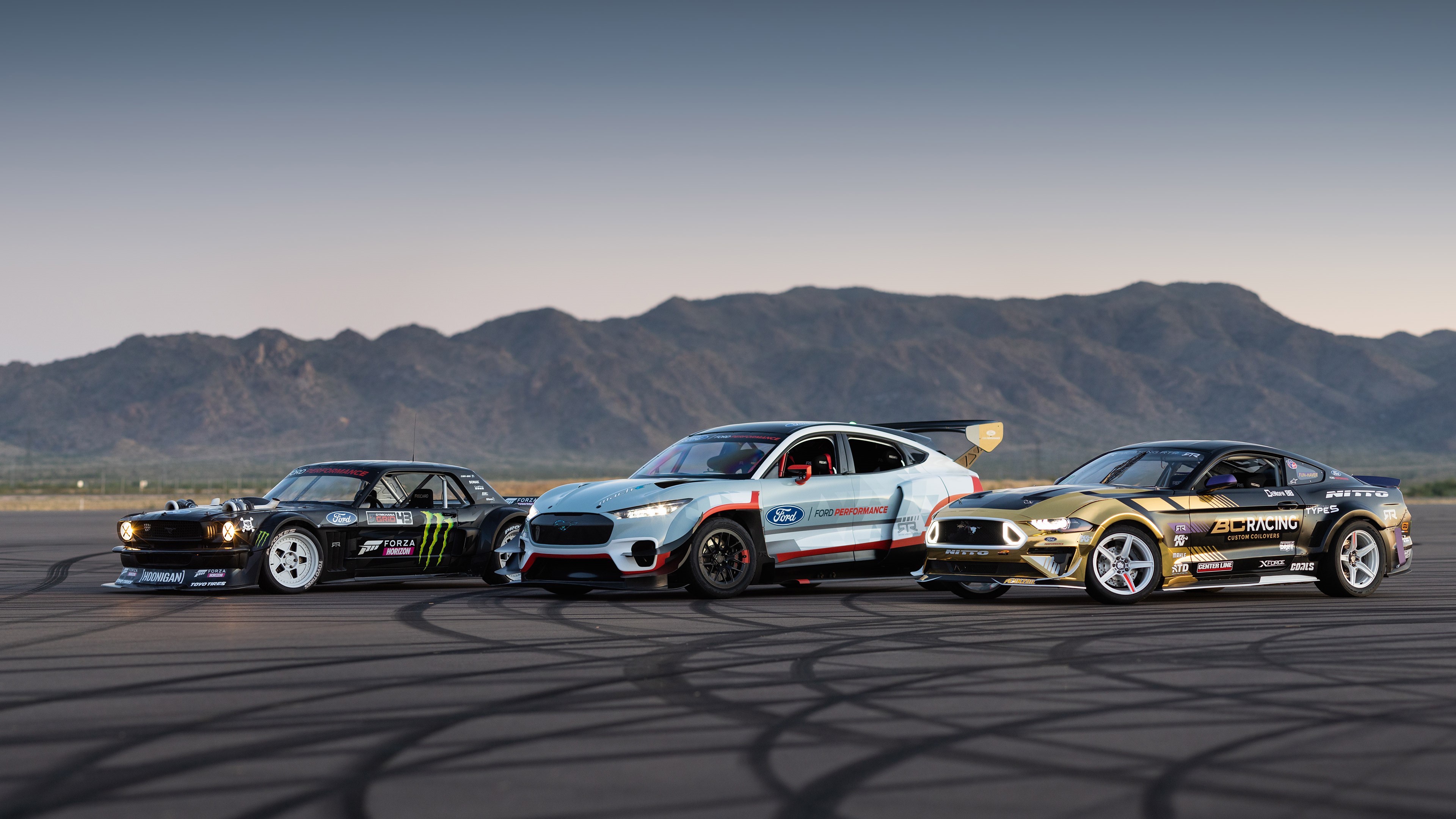 Ford Mustang Mach-E and Mustangs on Track HD Wallpaper