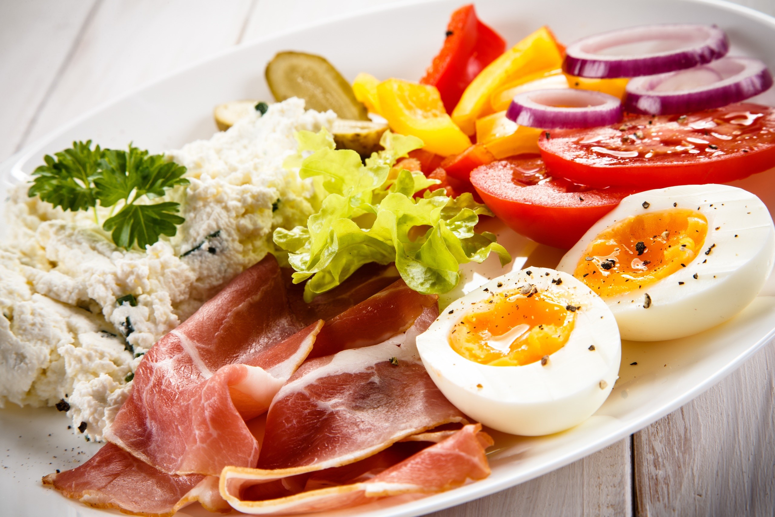 Plate of food with eggs, ham, cheese, and vegetables HD Wallpaper