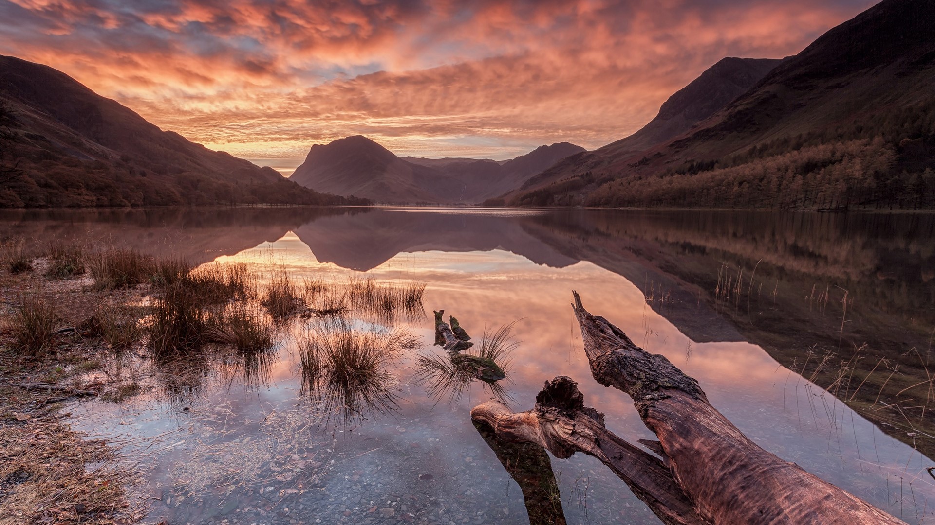 Lake reflection at sunset with mountains and clouds HD Wallpaper
