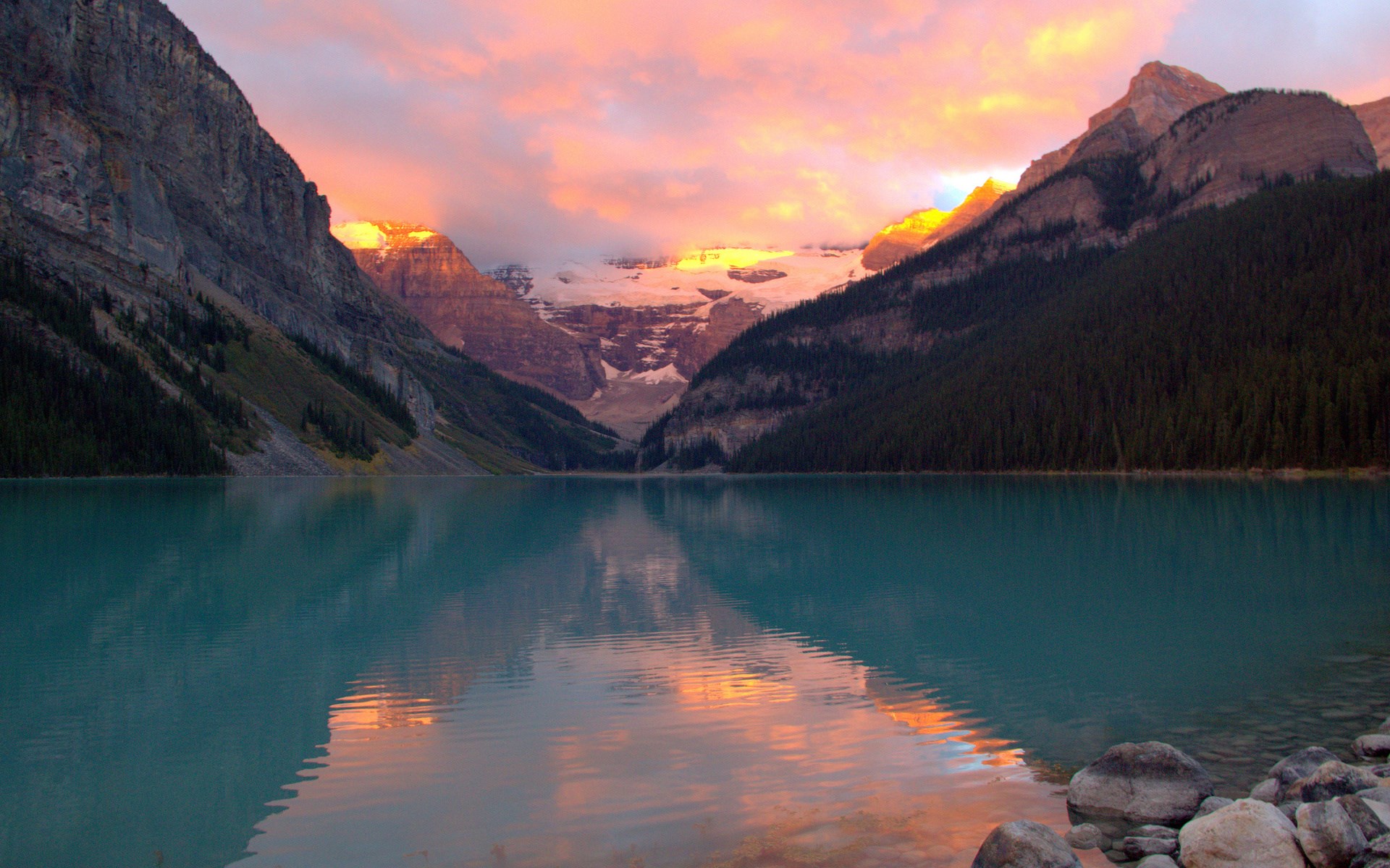 Lake Louise at sunset with mountains and reflection HD Wallpaper