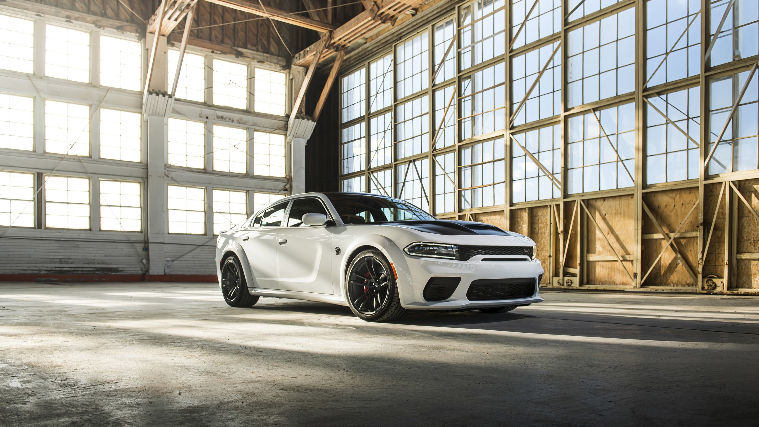 White Dodge Charger Hellcat in a hangar HD Wallpaper