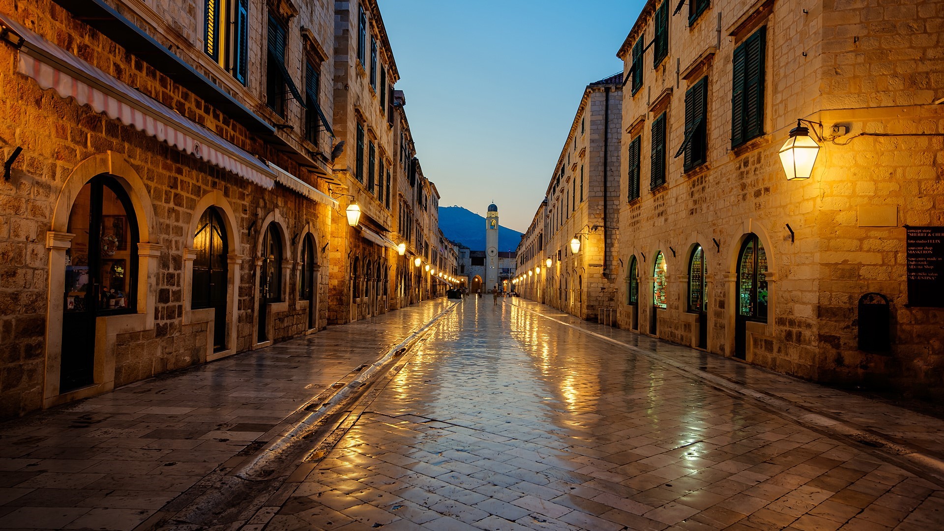 Dubrovnik street at sunrise with marble pavement and lights HD Wallpaper