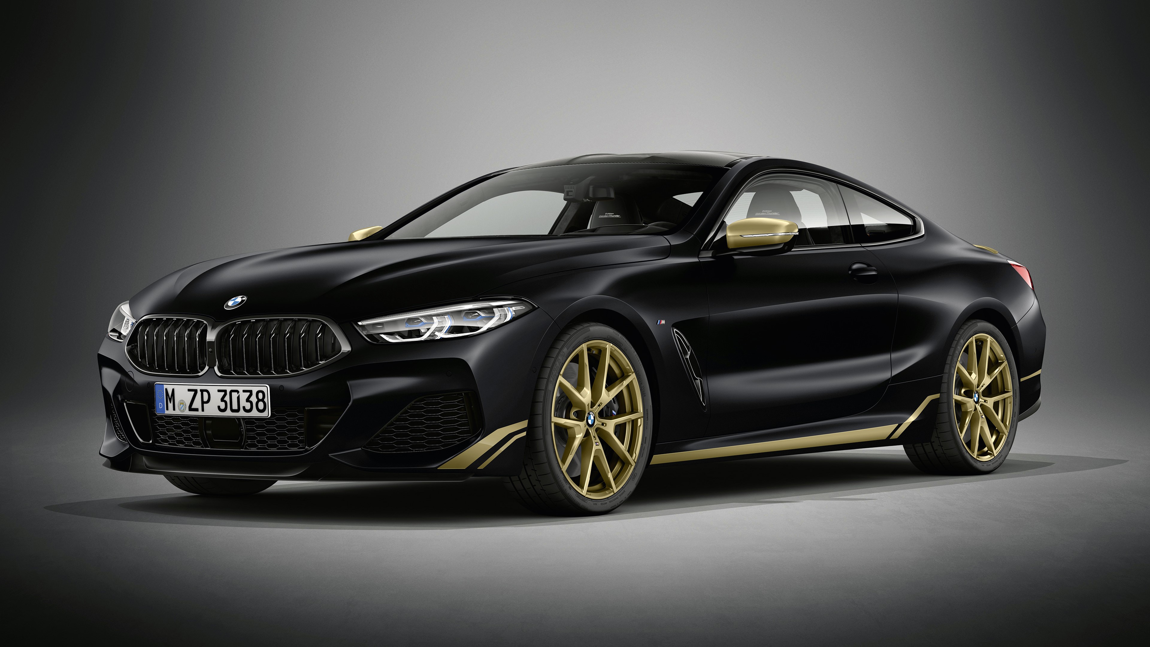 4K Black BMW M850i with Gold Accents HD Wallpaper