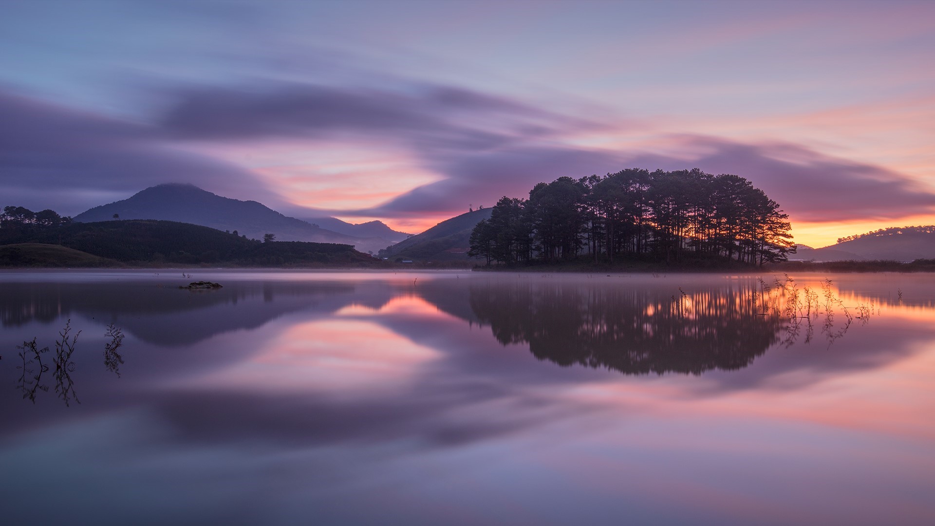 Long exposure lake at sunset with mountains and trees HD Wallpaper