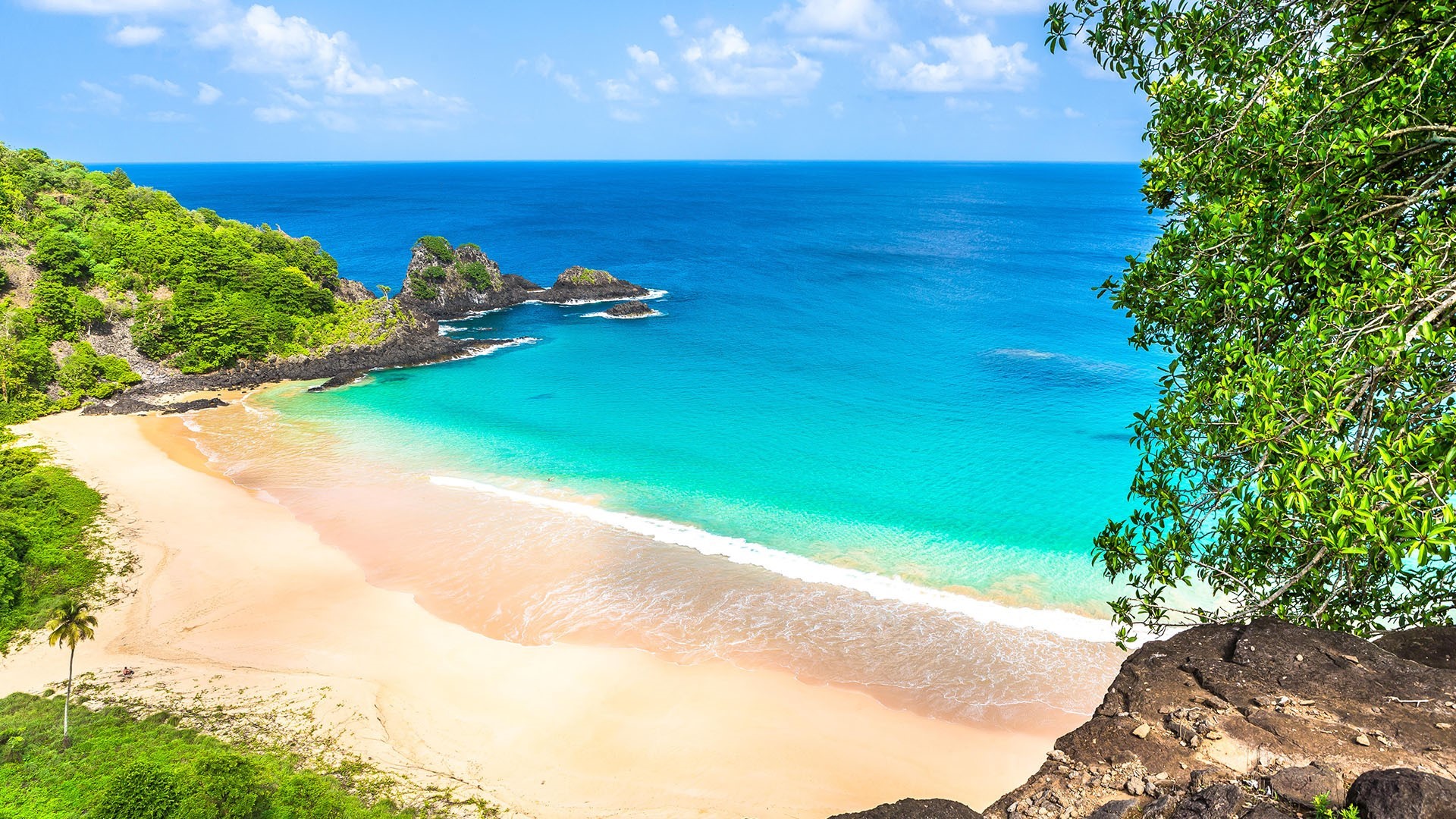 Beach with turquoise water and green hills in Brazil HD Wallpaper