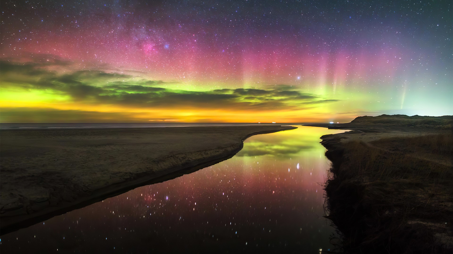 Aurora Borealis over a river and beach HD Wallpaper