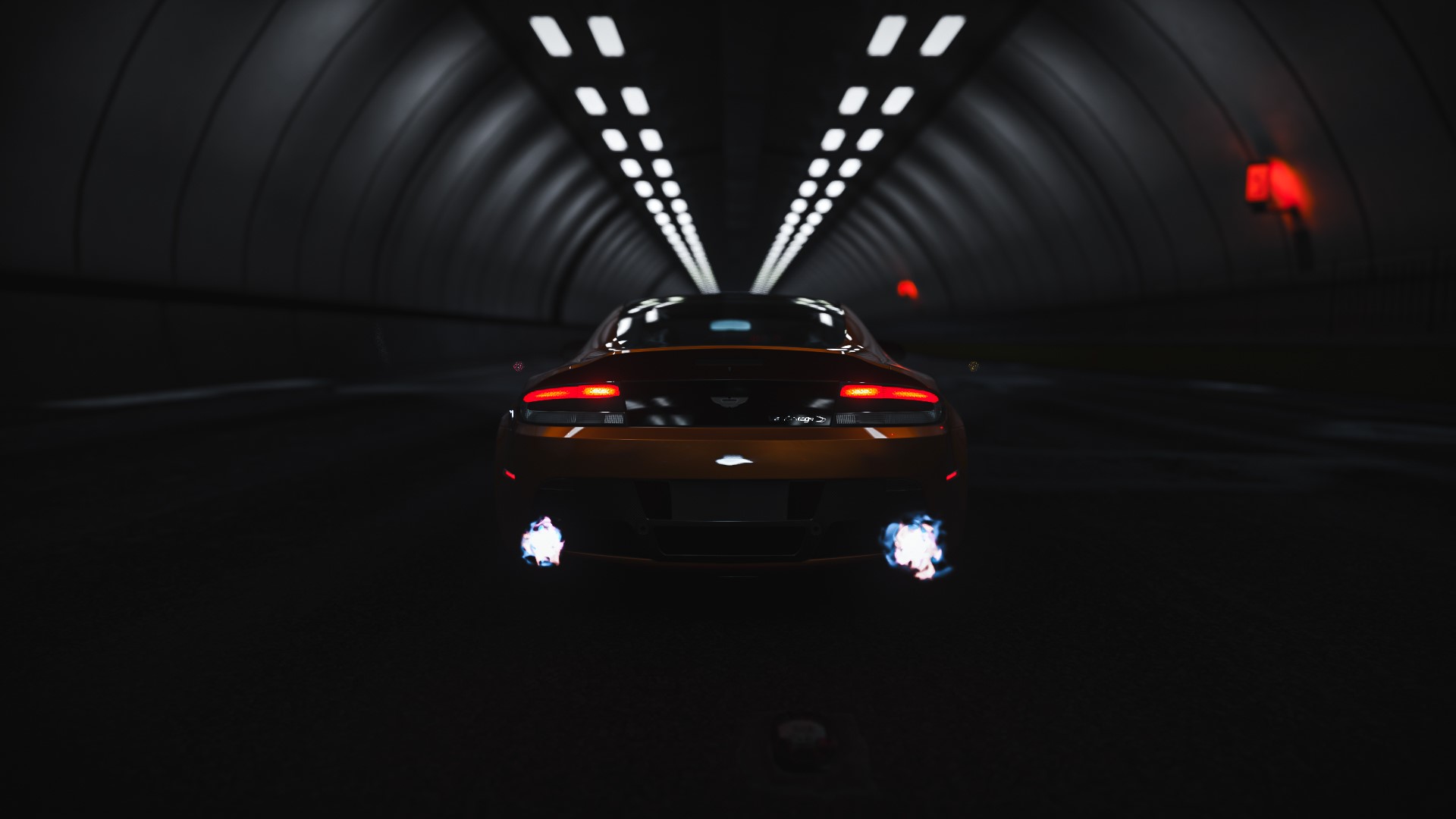 Aston Martin Vantage S driving through a tunnel HD Wallpaper