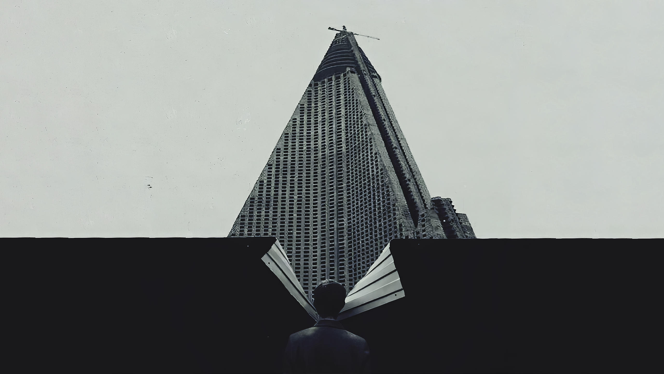 Man looking at unfinished skyscraper HD Wallpaper