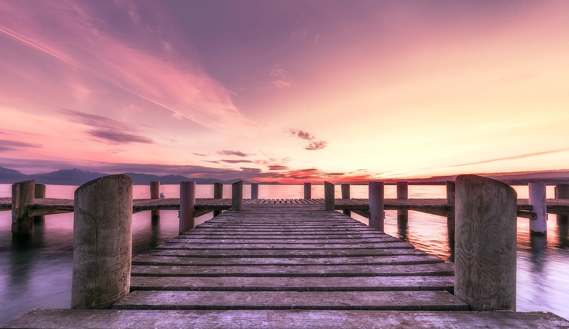 Wooden pier on a lake at sunset HD Wallpaper