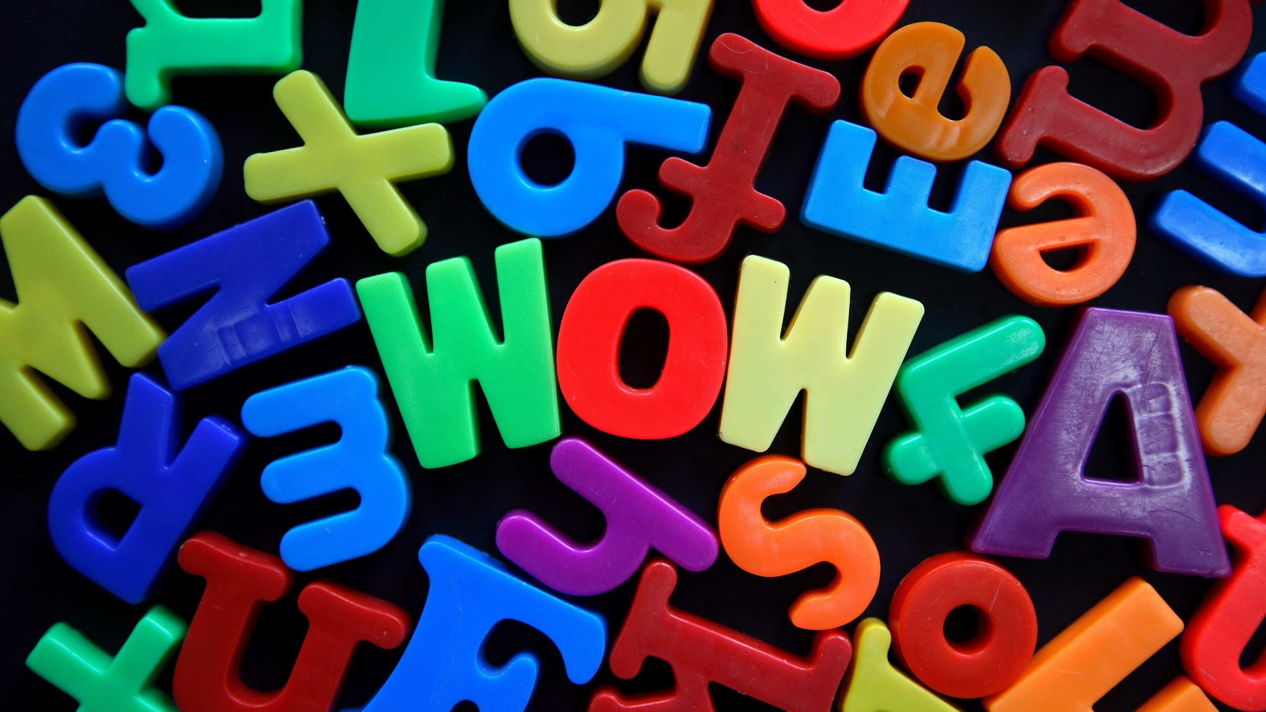 Colorful plastic letters spelling WOW HD Wallpaper
