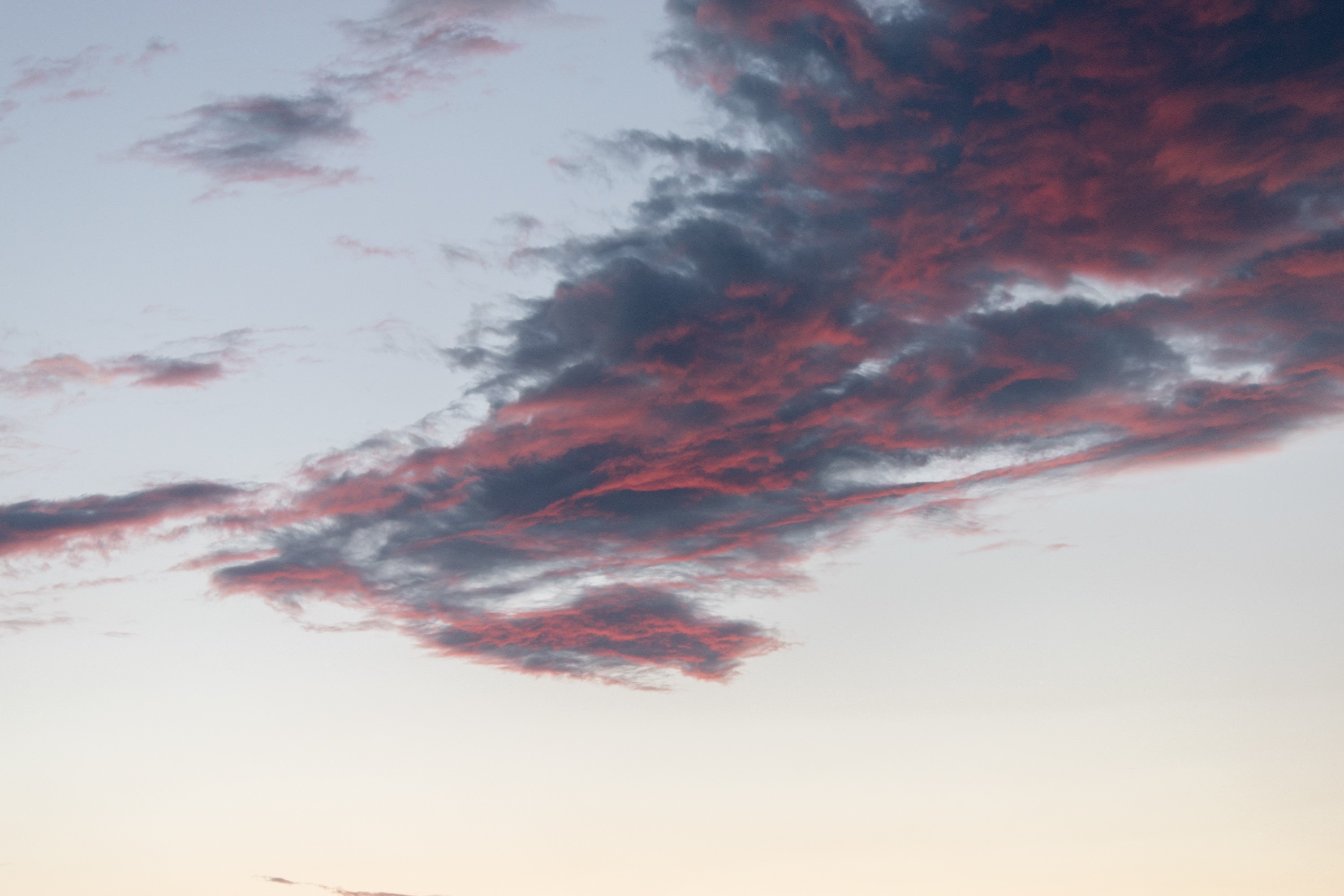 Pink and gray clouds in the sky at sunset HD Wallpaper