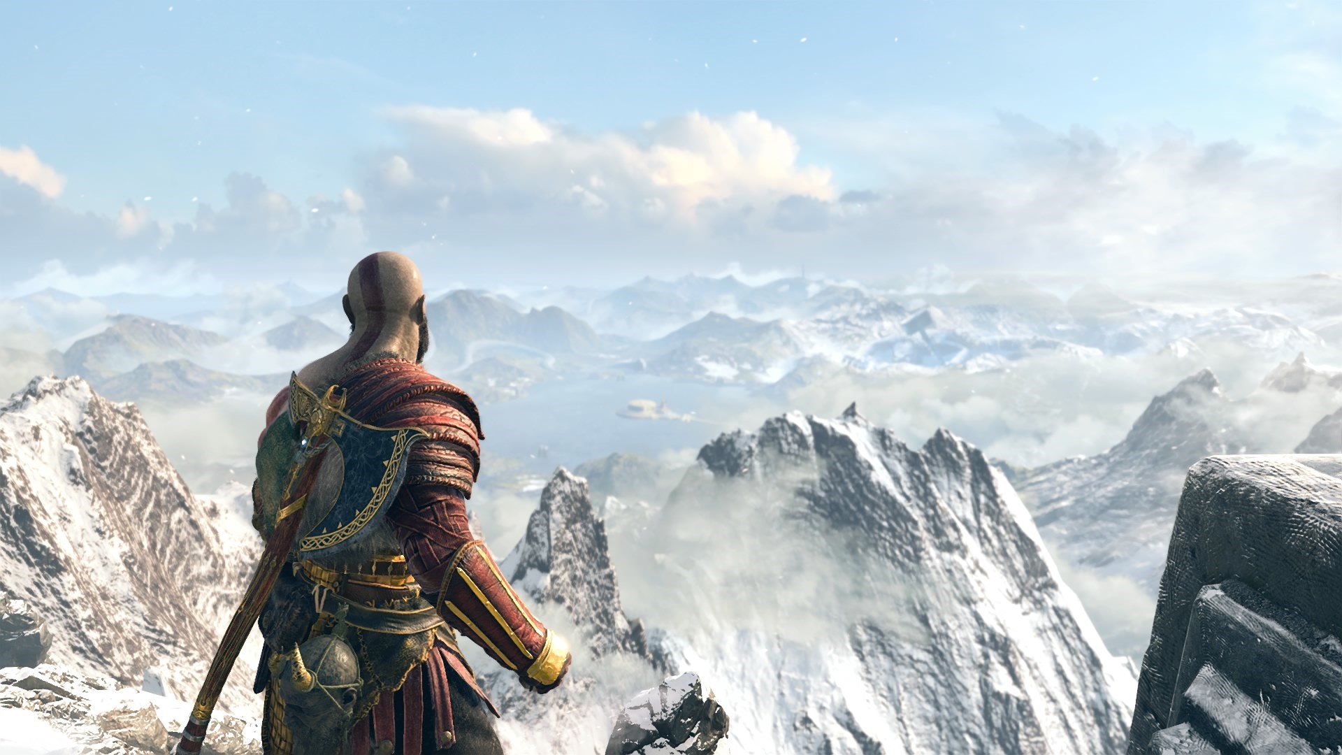 Kratos from God of War overlooking a snowy mountain range HD Wallpaper