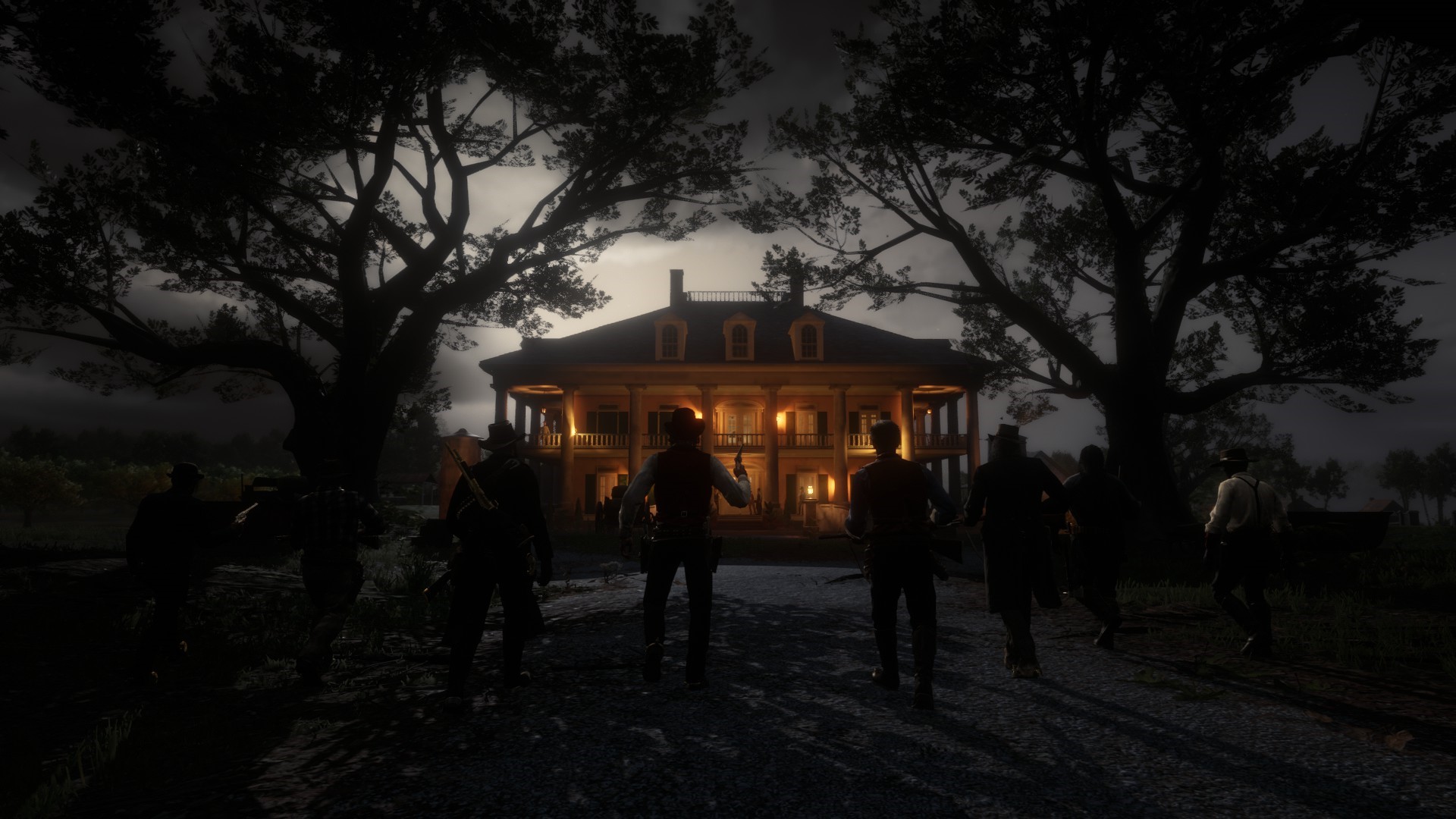 Group of men approaching a large illuminated mansion at night HD Wallpaper